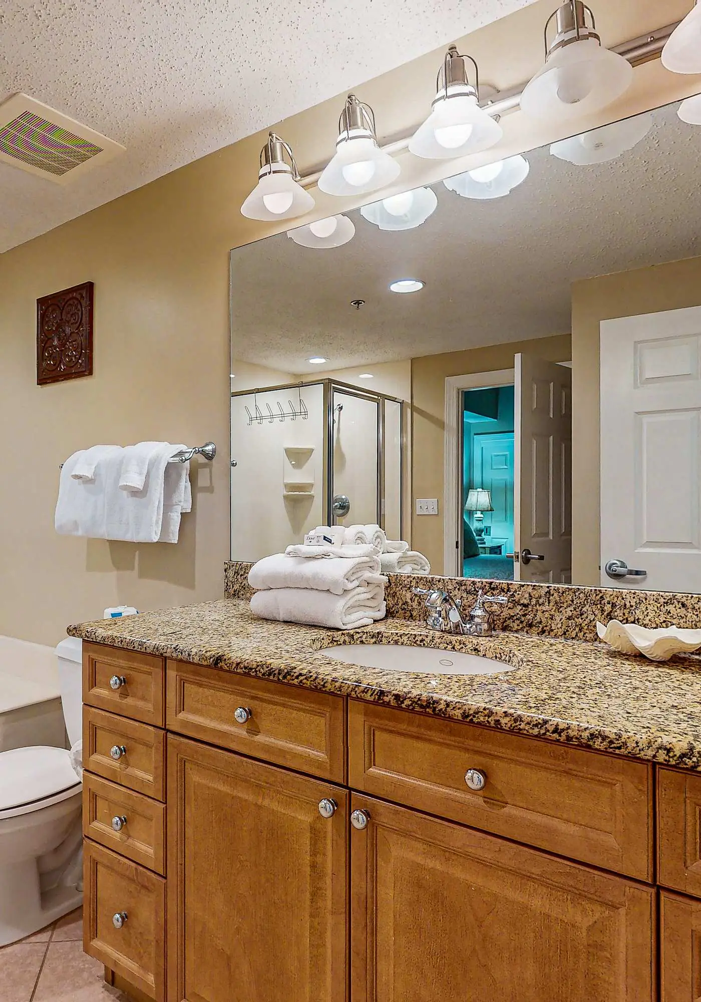 Spacious condo with Gulf-front views & access to pools, hot tub, gym