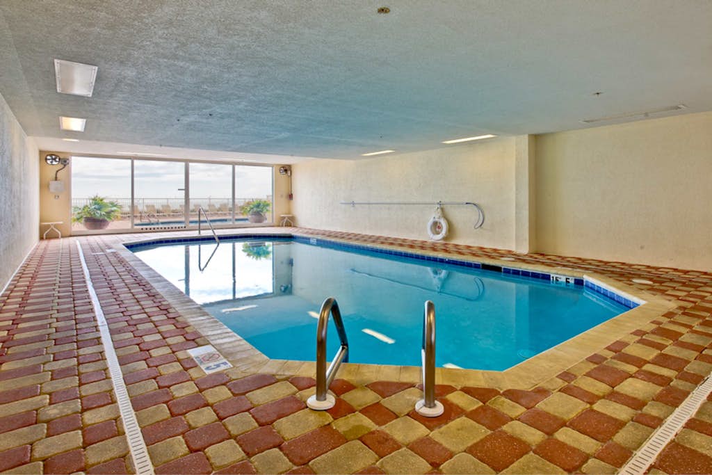 Beachfront condo overlooking the Gulf w/ balcony & indoor/outdoor pools