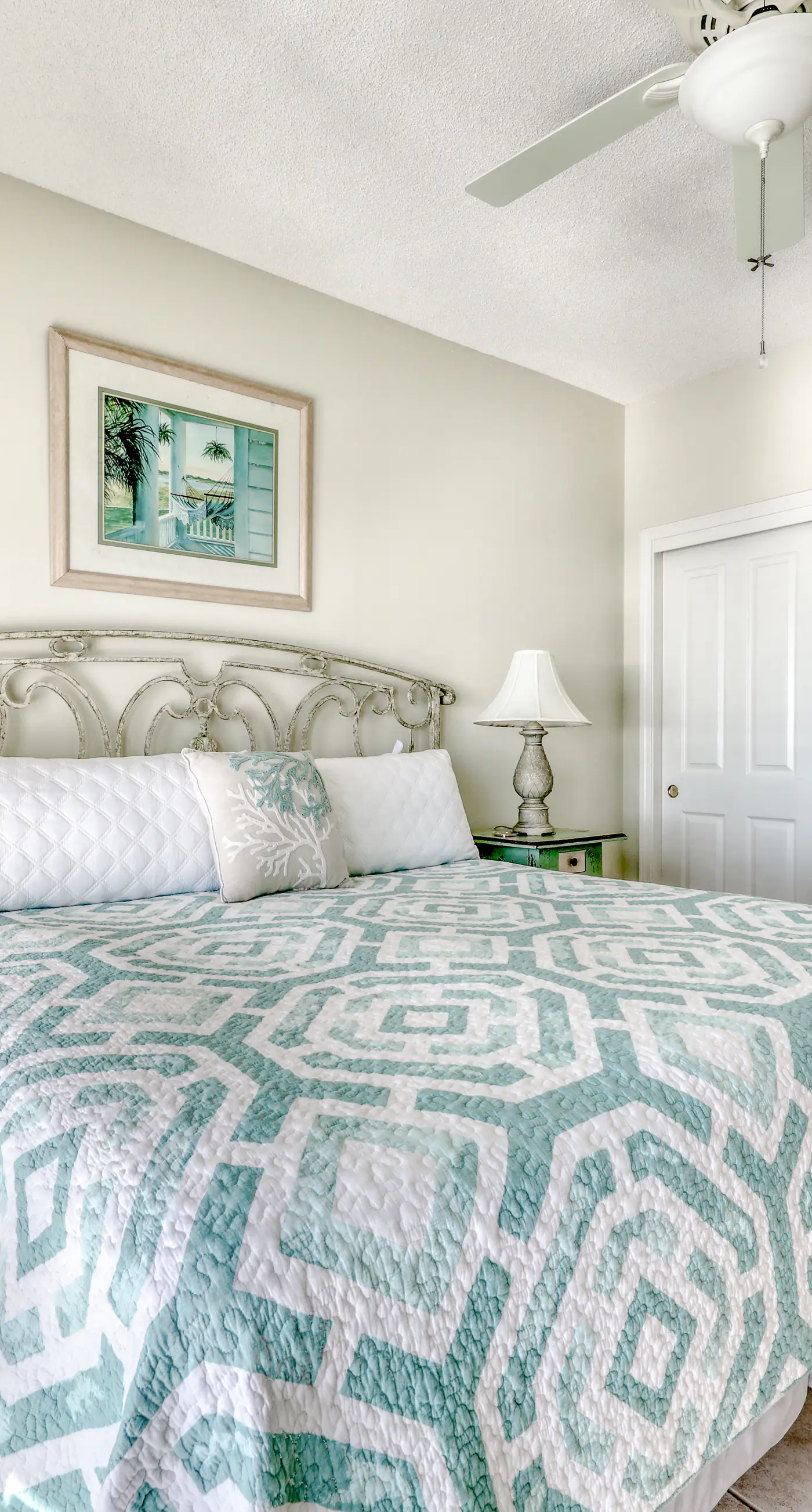 Waterfront corner condo with shared pools, wrap-around balcony, & tennis courts