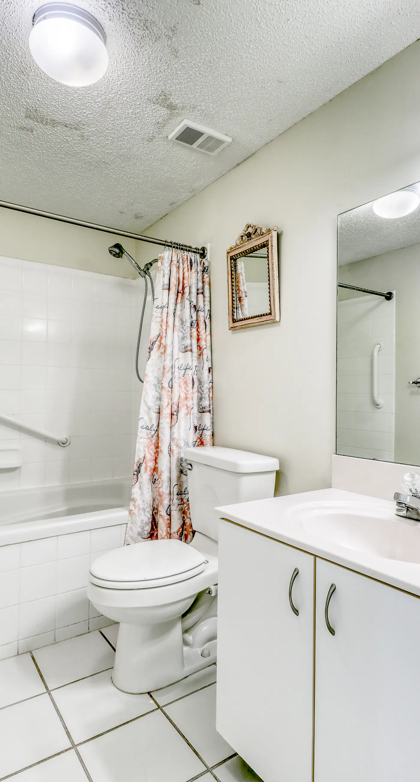 Waterfront corner condo with shared pools, wrap-around balcony, & tennis courts
