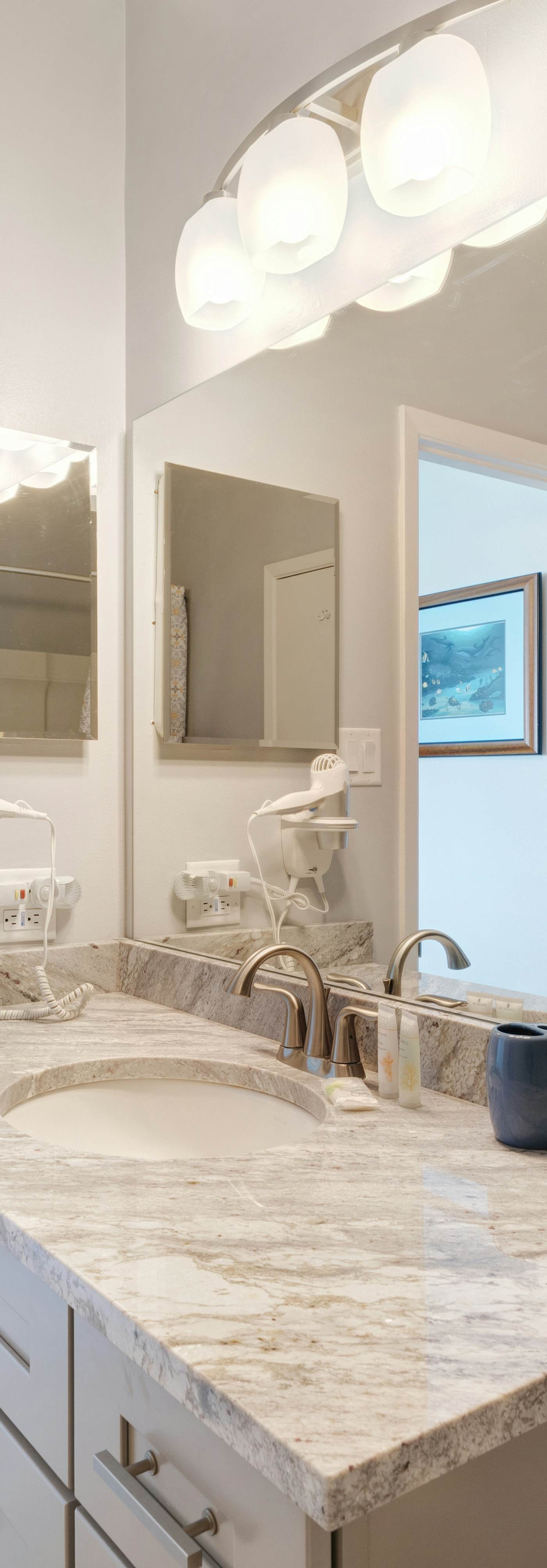 Casual beachfront getaway with pool, ocean views, & beach access