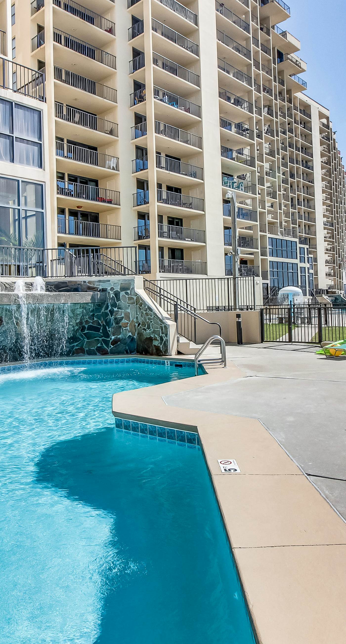 Casual beachfront getaway with pool, ocean views, & beach access