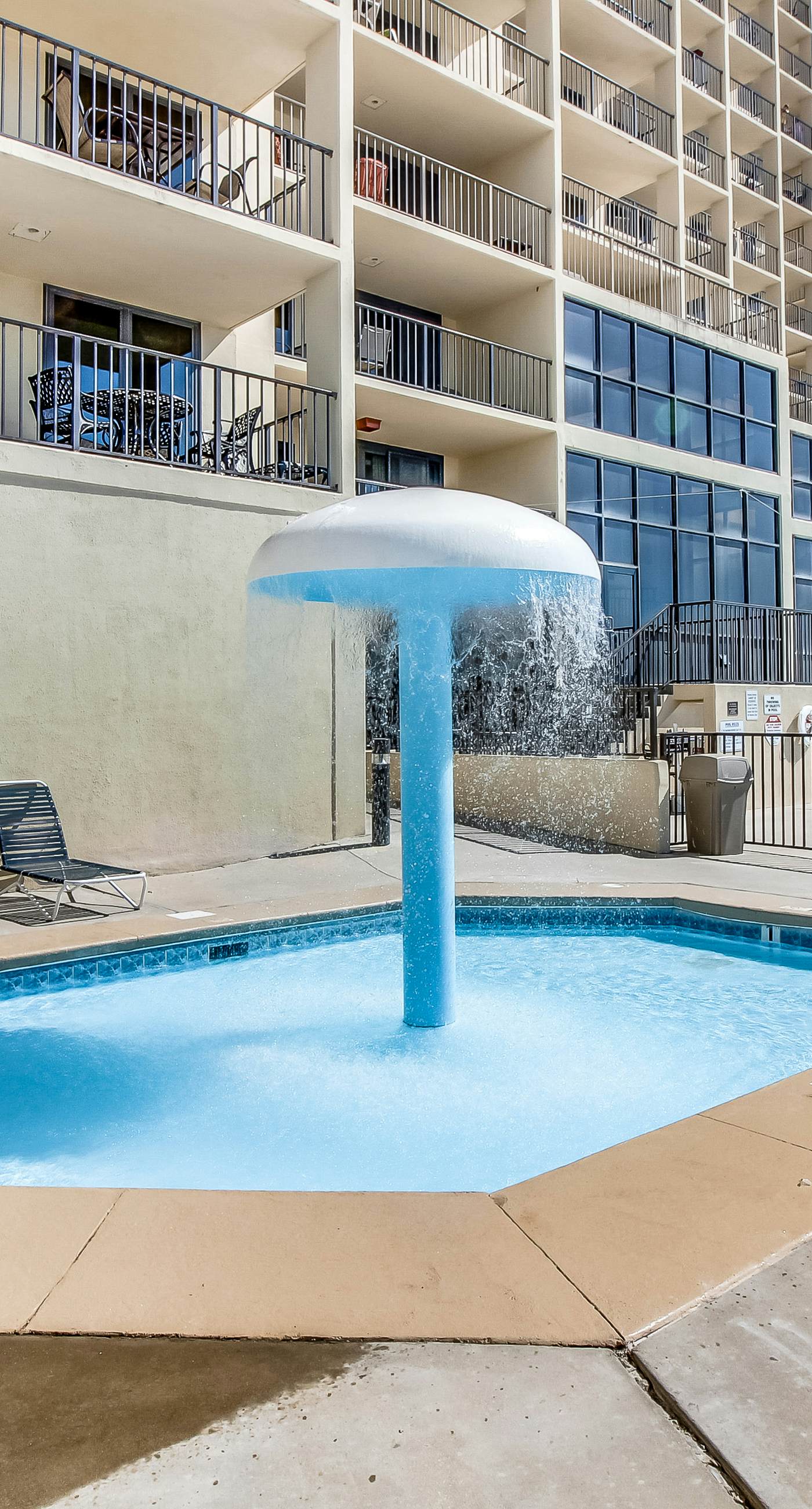 Casual beachfront getaway with pool, ocean views, & beach access