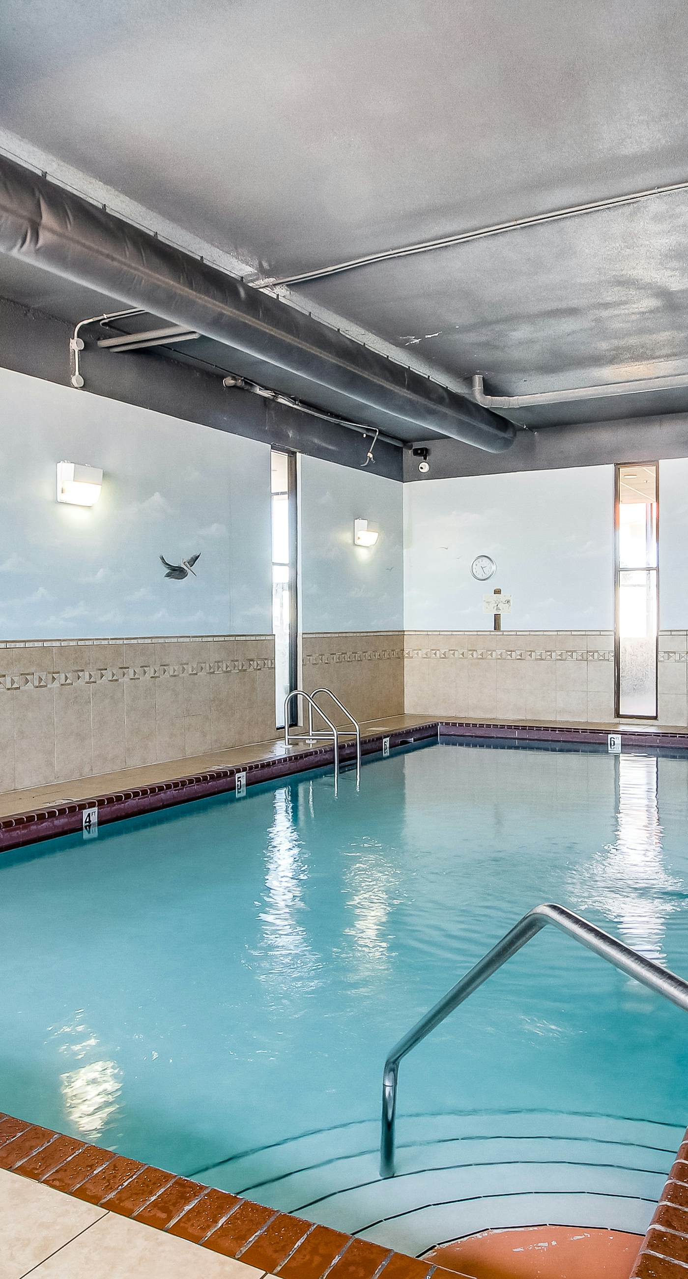 Casual beachfront getaway with pool, ocean views, & beach access