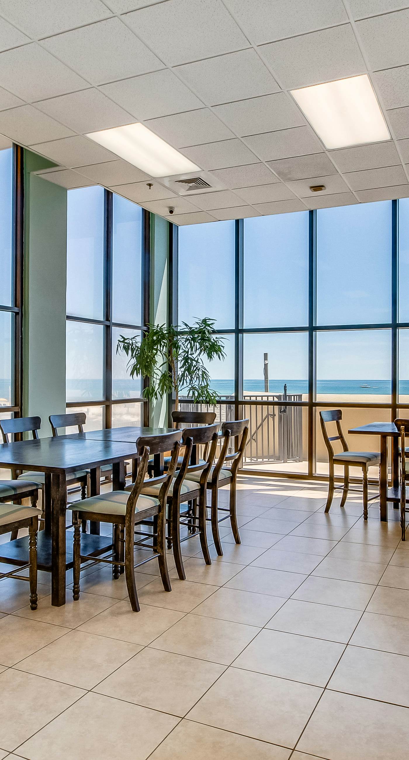 Casual beachfront getaway with pool, ocean views, & beach access