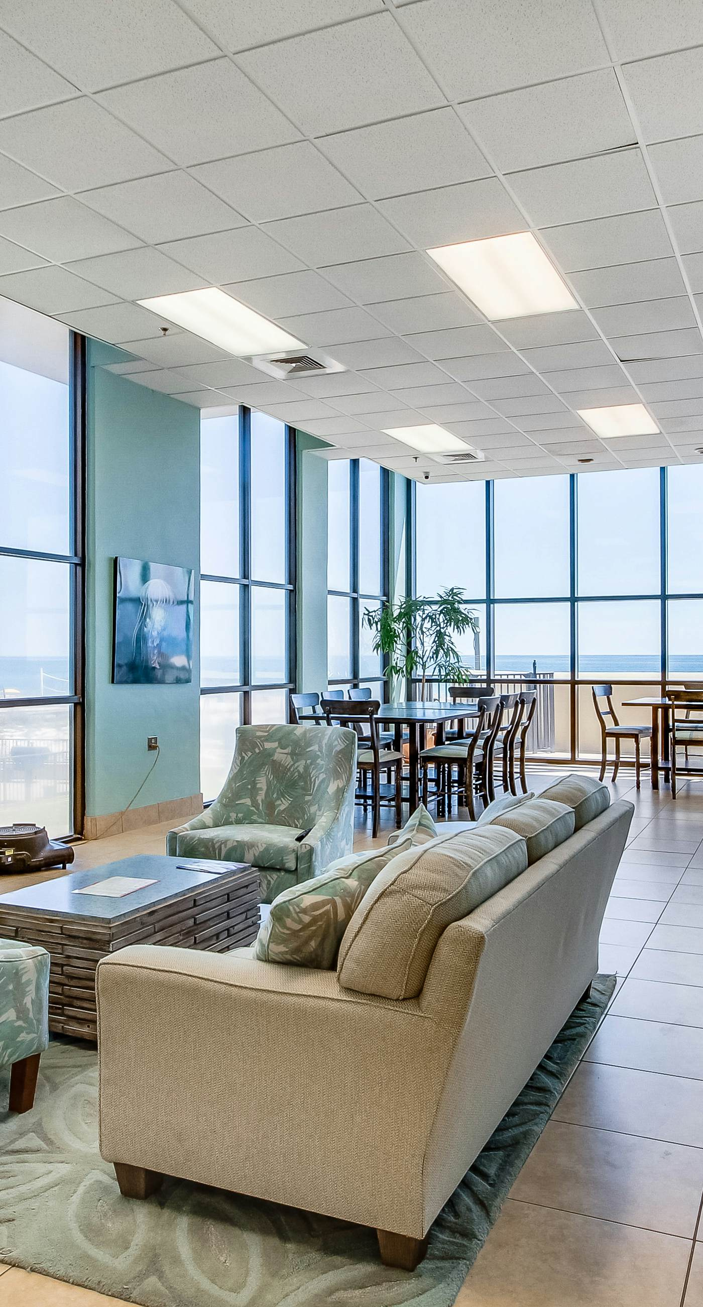 Casual beachfront getaway with pool, ocean views, & beach access