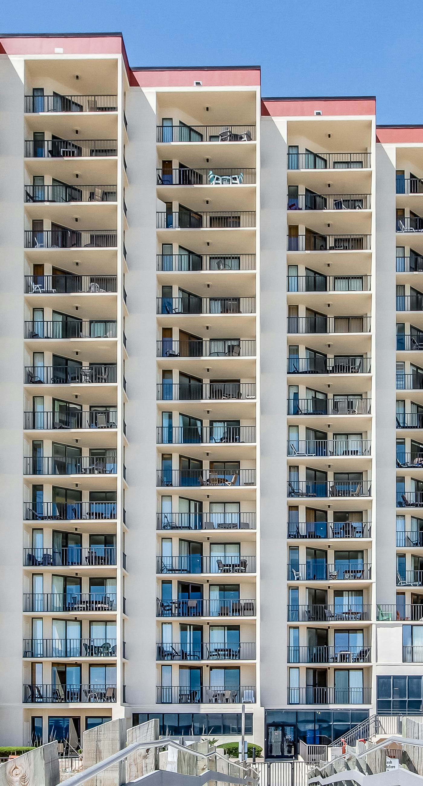 Casual beachfront getaway with pool, ocean views, & beach access