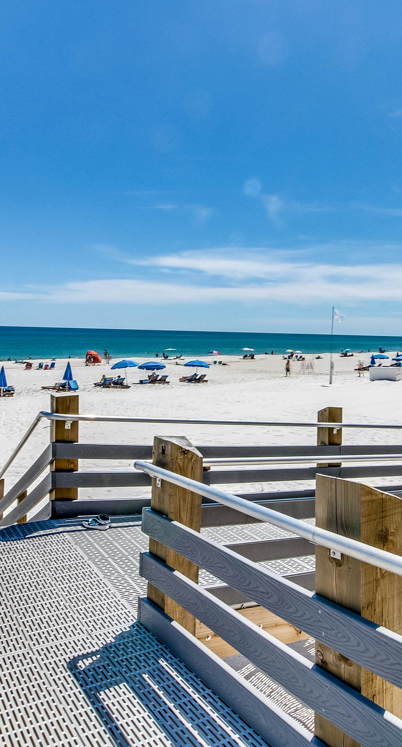 Casual beachfront getaway with pool, ocean views, & beach access