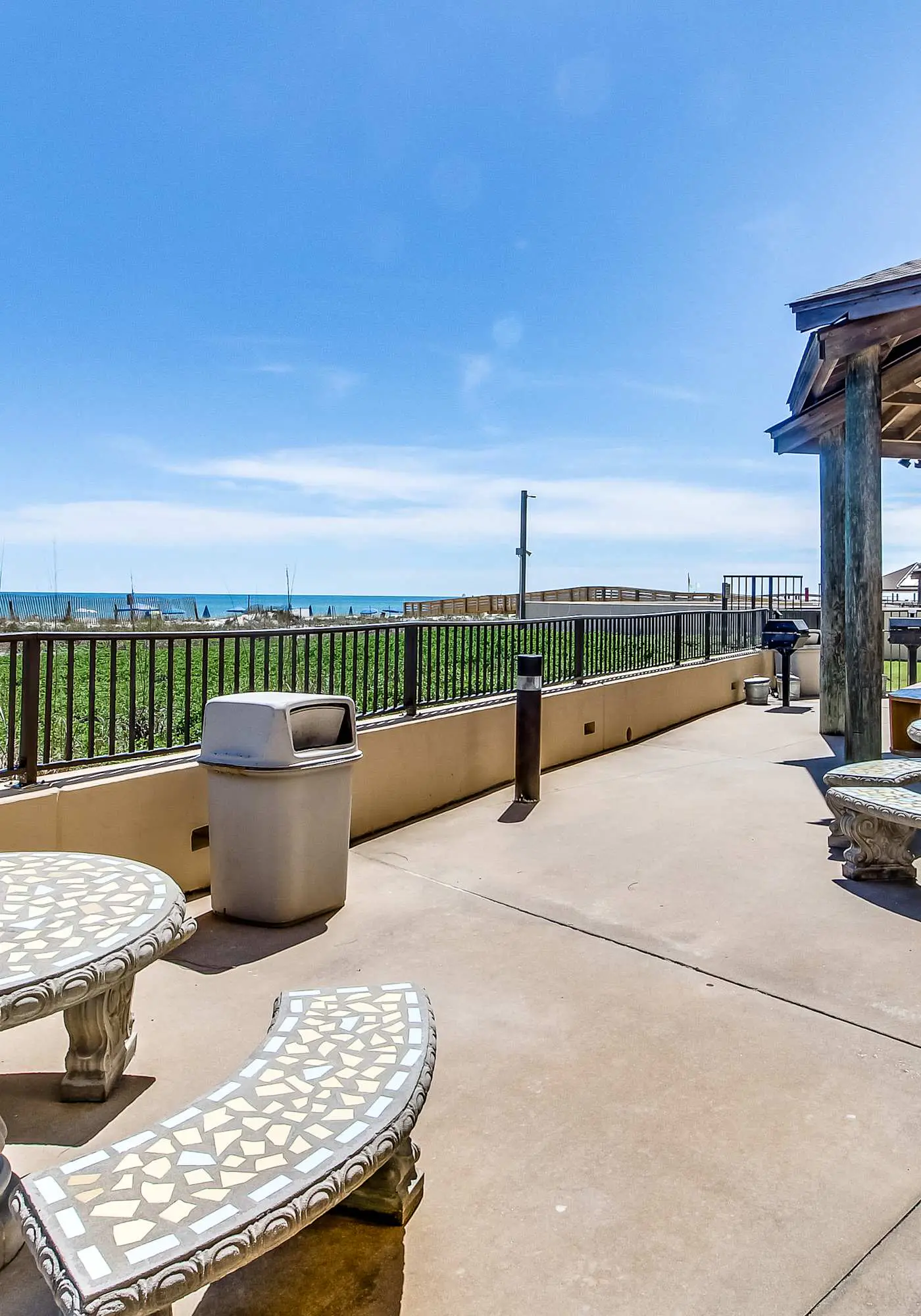 Casual beachfront getaway with pool, ocean views, & beach access