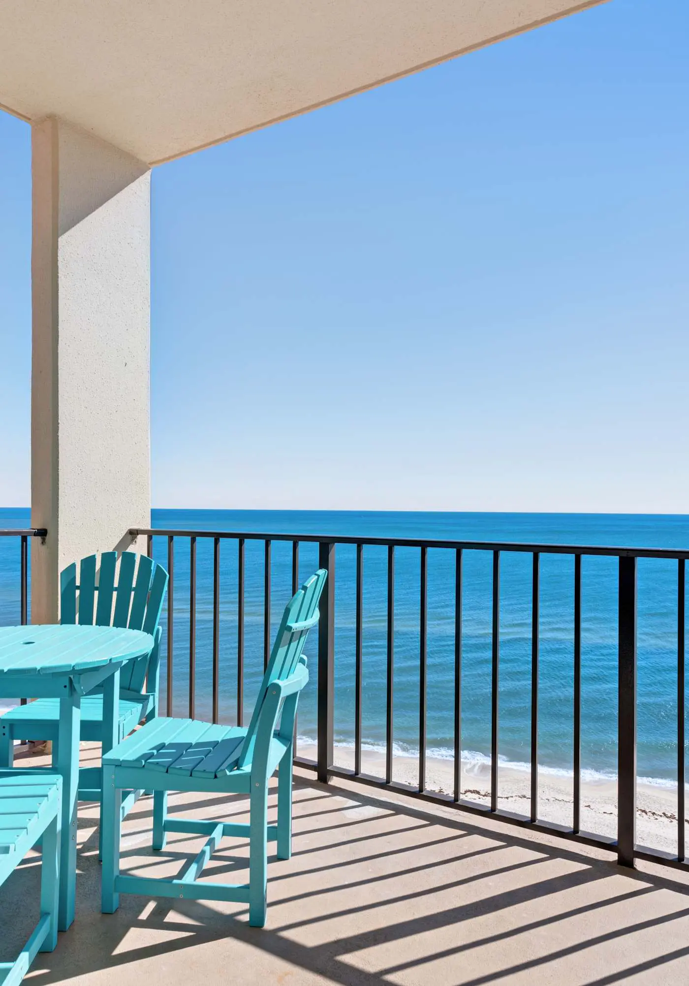 Casual beachfront getaway with pool, ocean views, & beach access