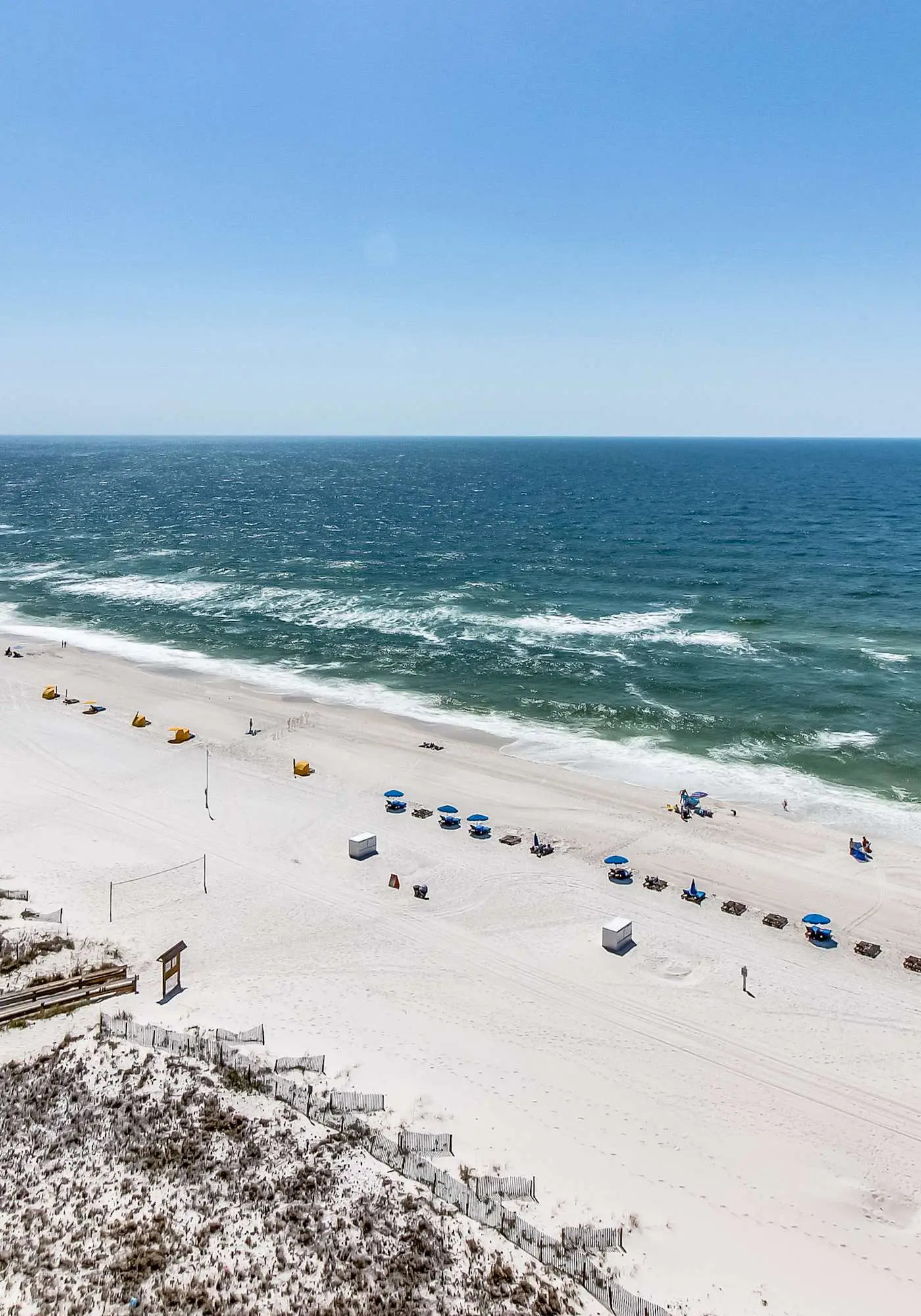 Casual beachfront getaway with pool, ocean views, & beach access