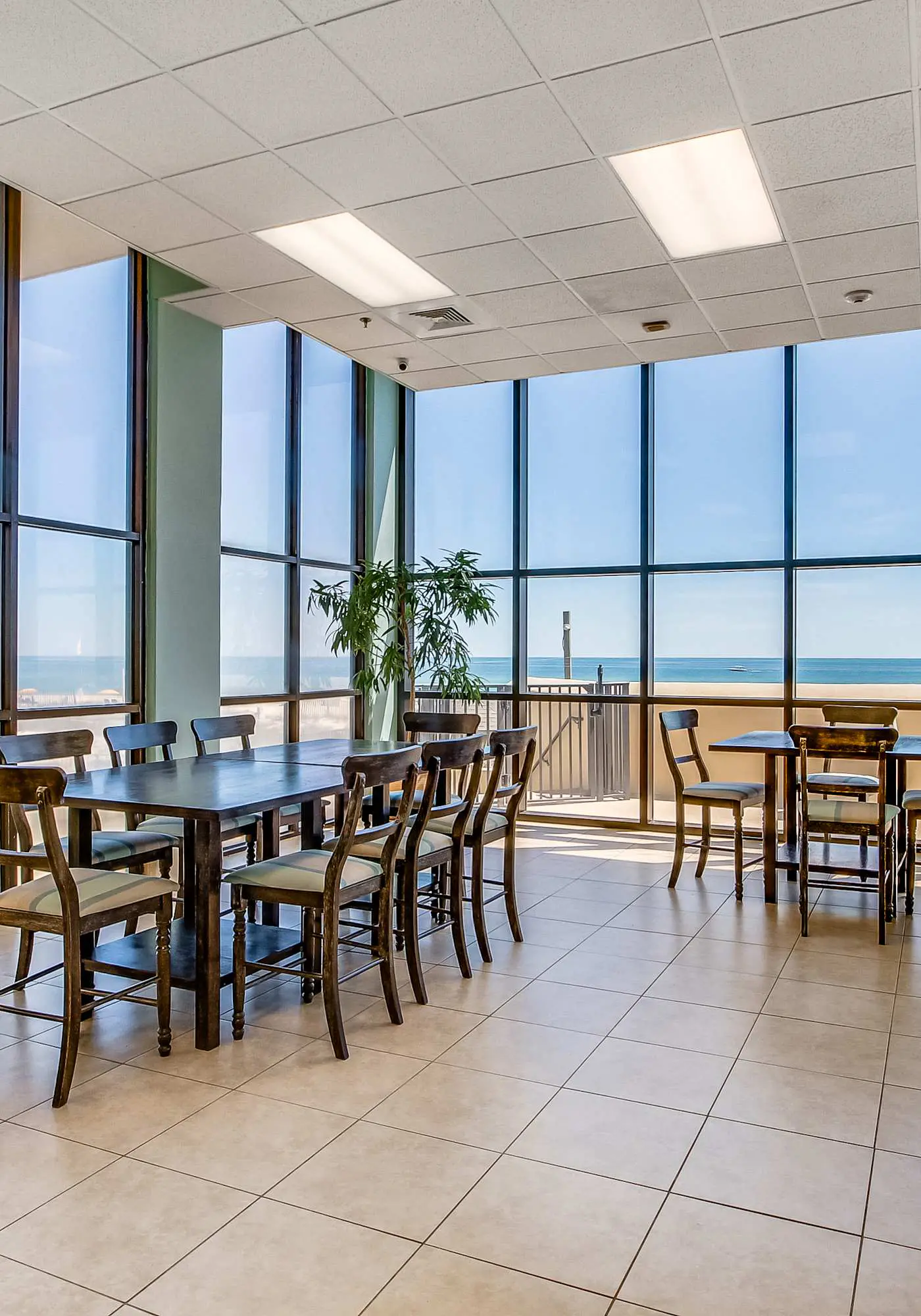 Casual beachfront getaway with pool, ocean views, & beach access
