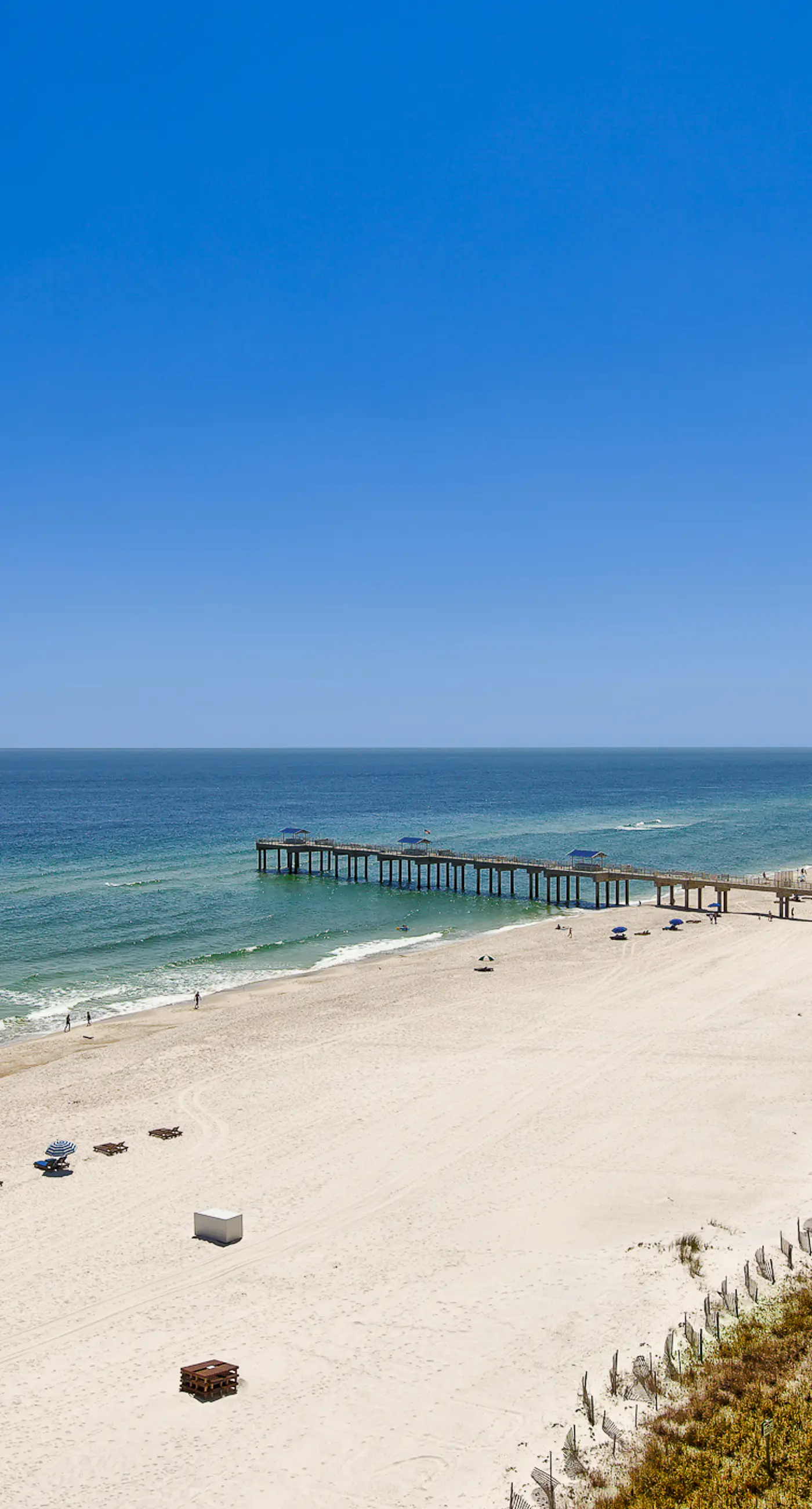 Family-friendly, Gulf-front condo with private balcony and resort style pools, sauna and gym