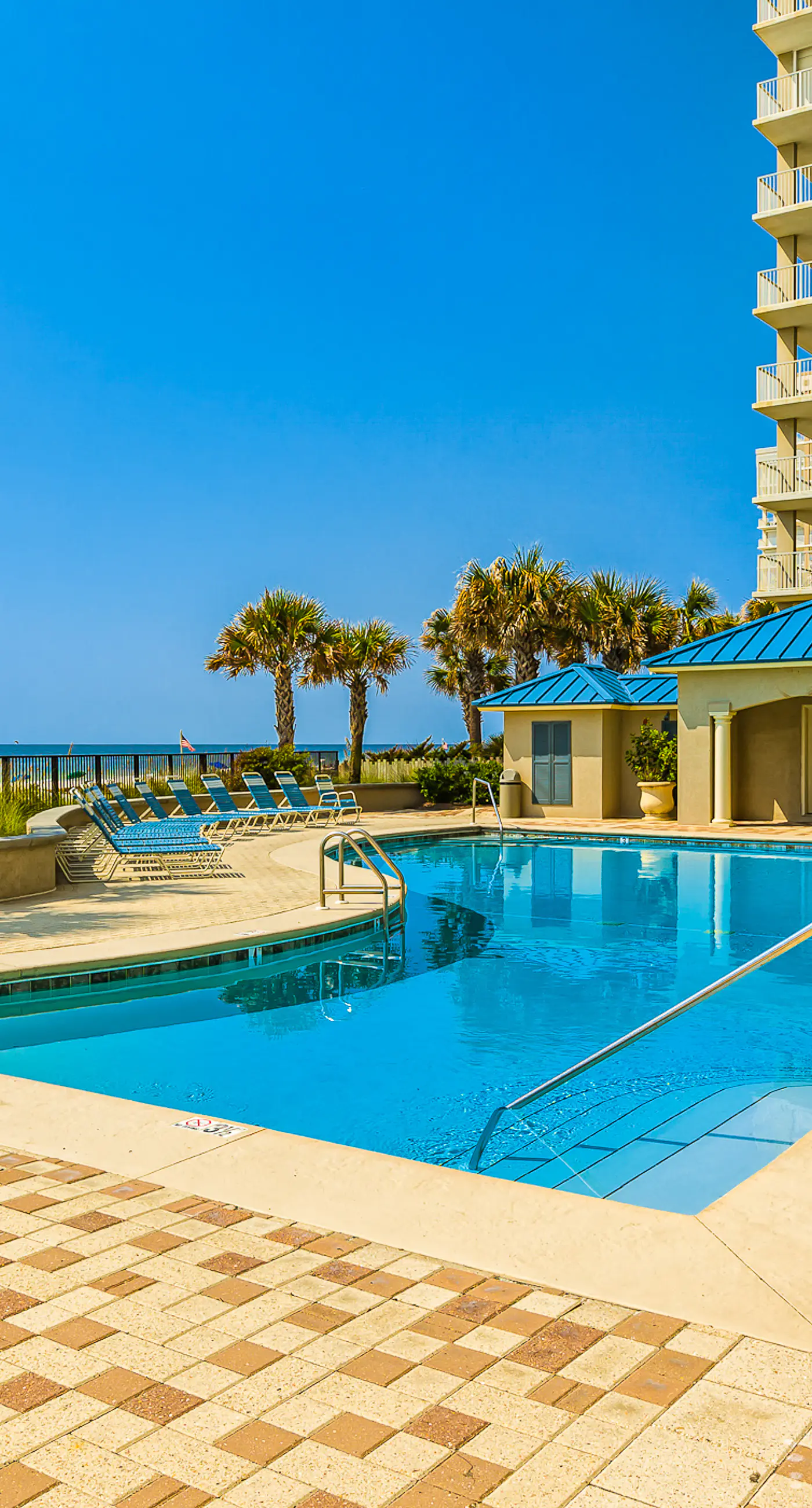 Inviting Gulf-front condo with hot tub, pool & spacious, furnished balcony