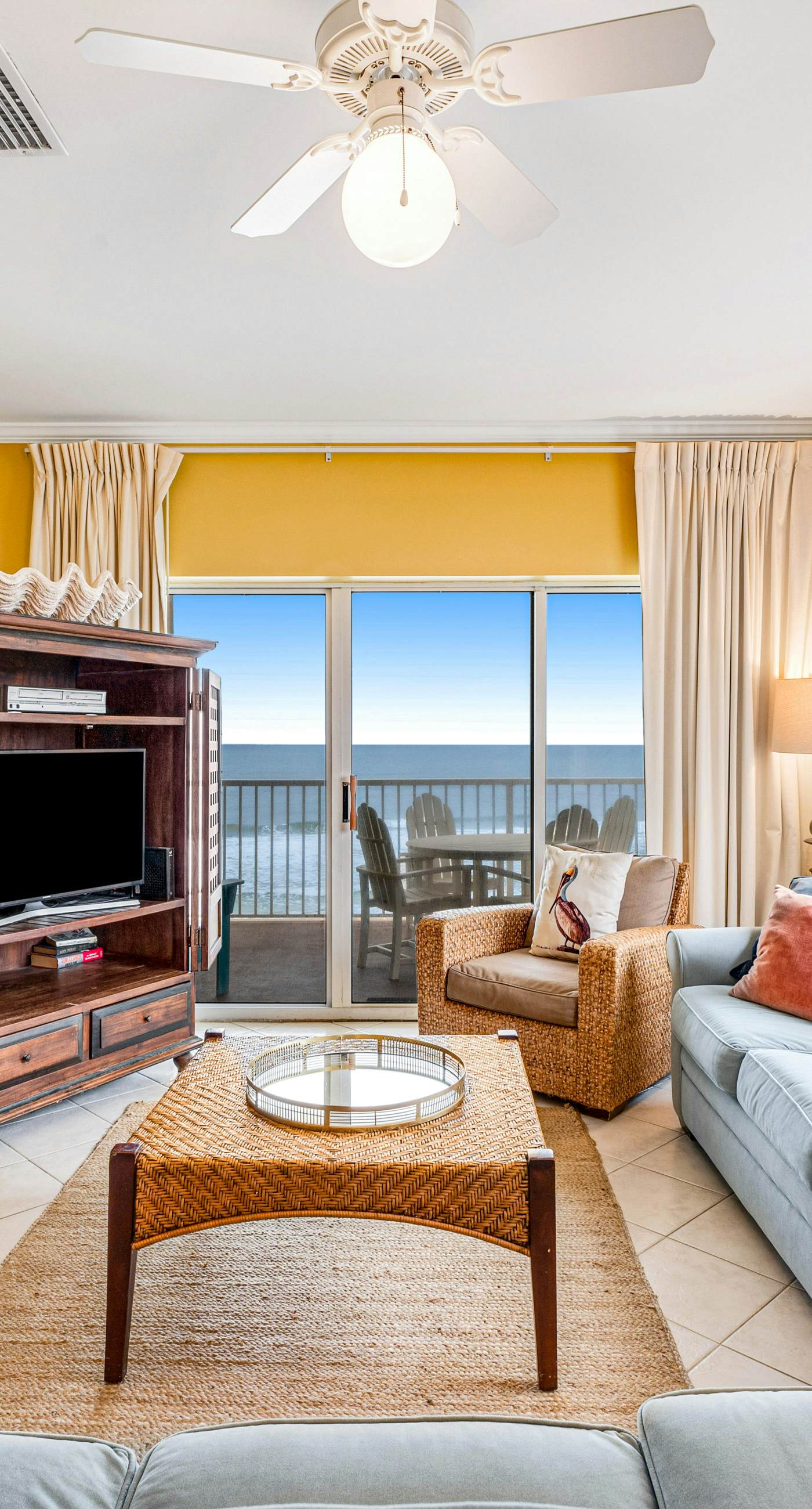 Beachfront condo with Gulf front shared pool, private balcony, and grilling area
