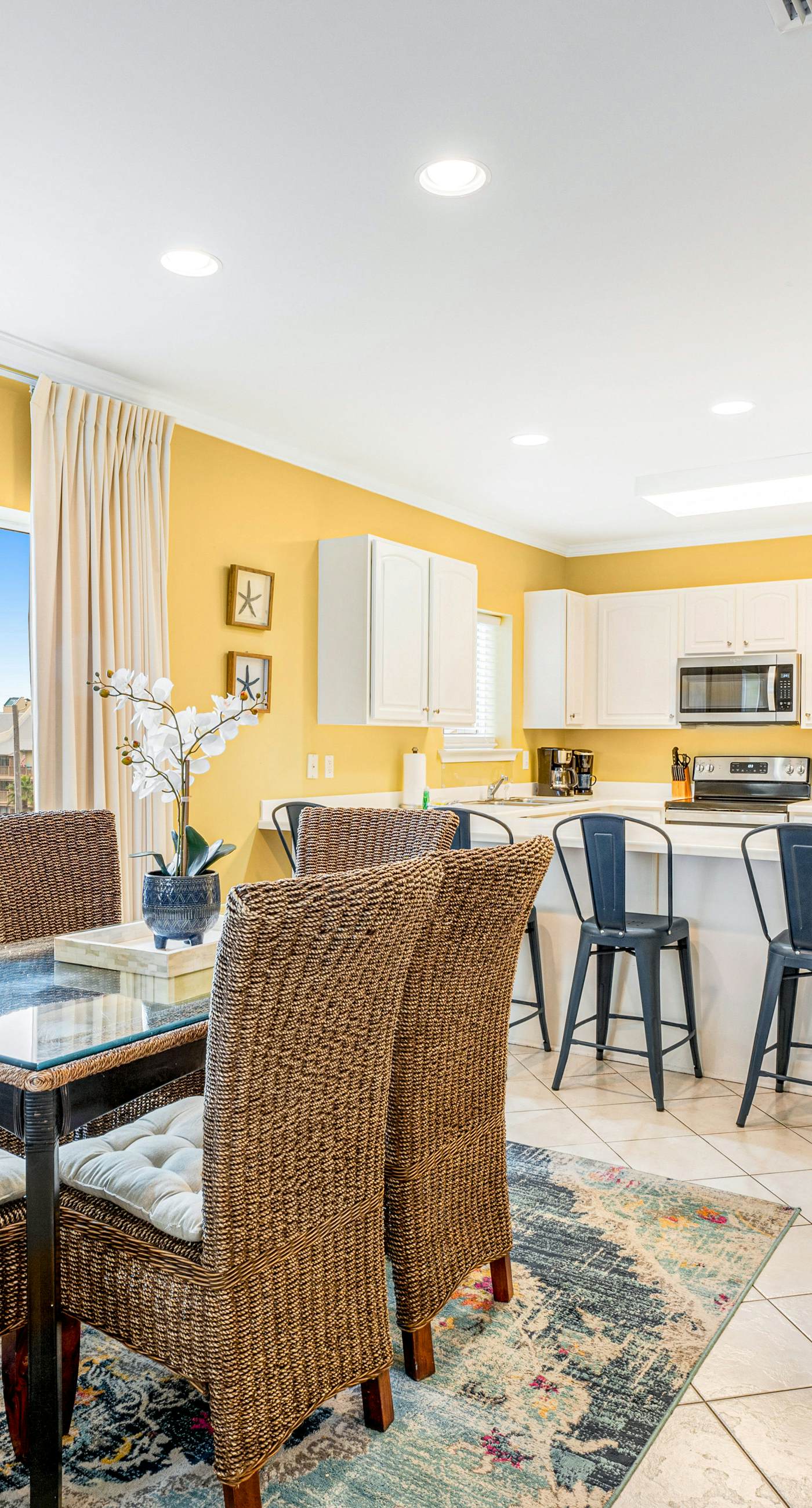 Beachfront condo with Gulf front shared pool, private balcony, and grilling area