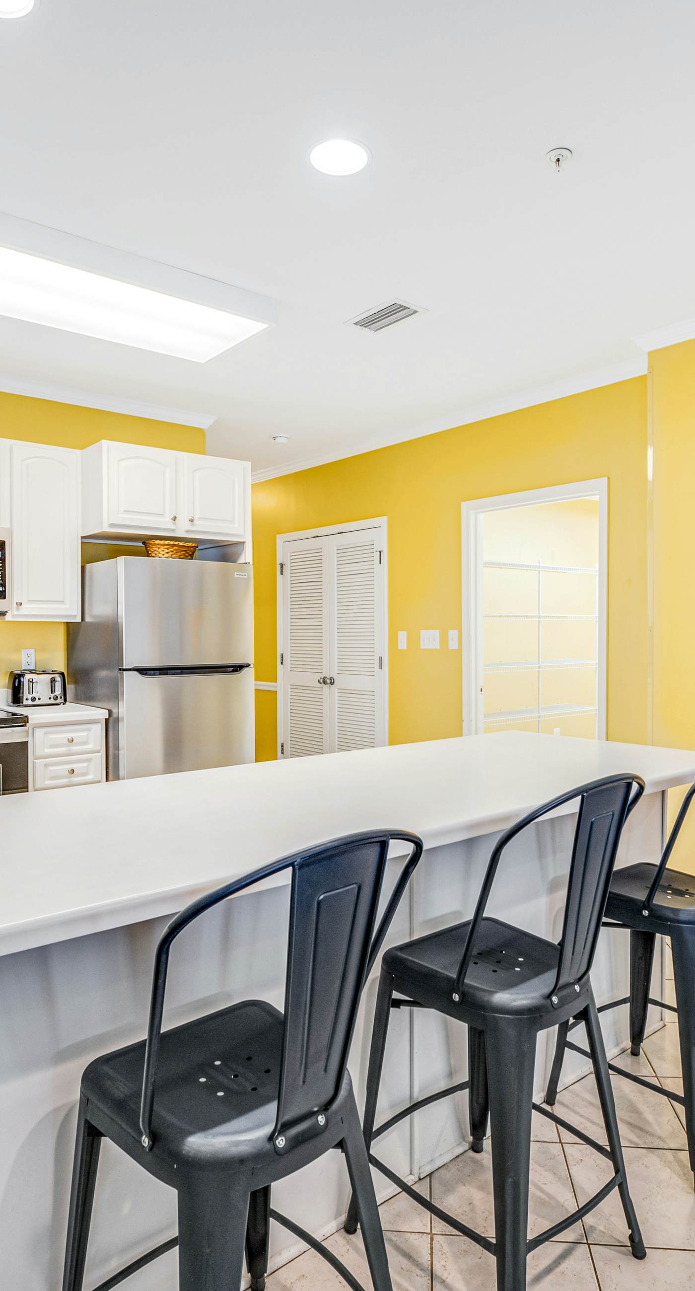 Beachfront condo with Gulf front shared pool, private balcony, and grilling area