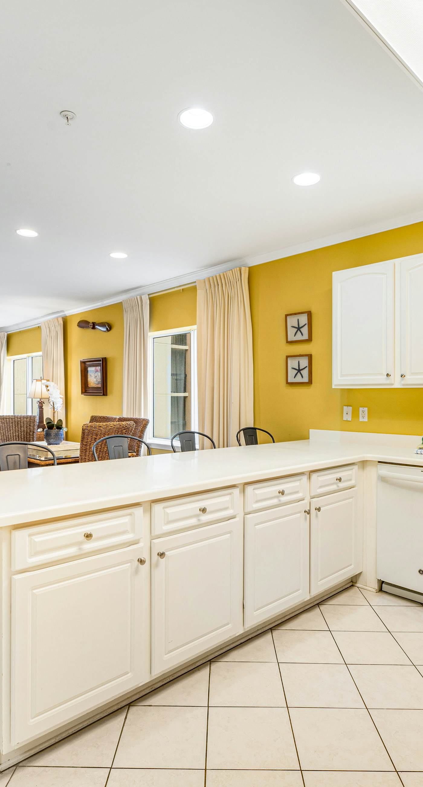 Beachfront condo with Gulf front shared pool, private balcony, and grilling area