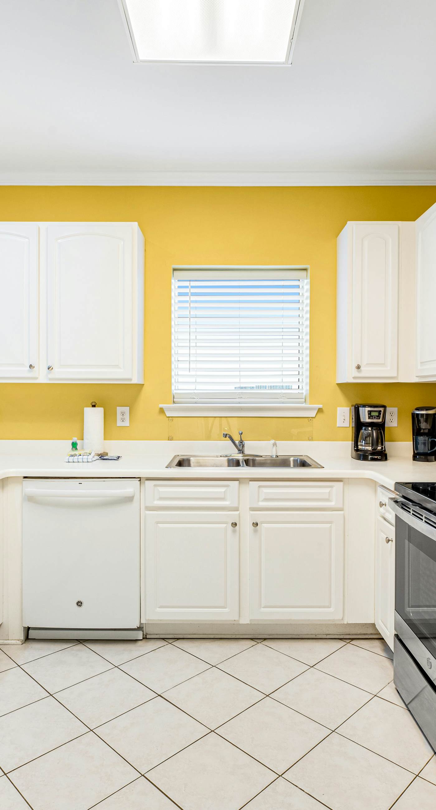 Beachfront condo with Gulf front shared pool, private balcony, and grilling area