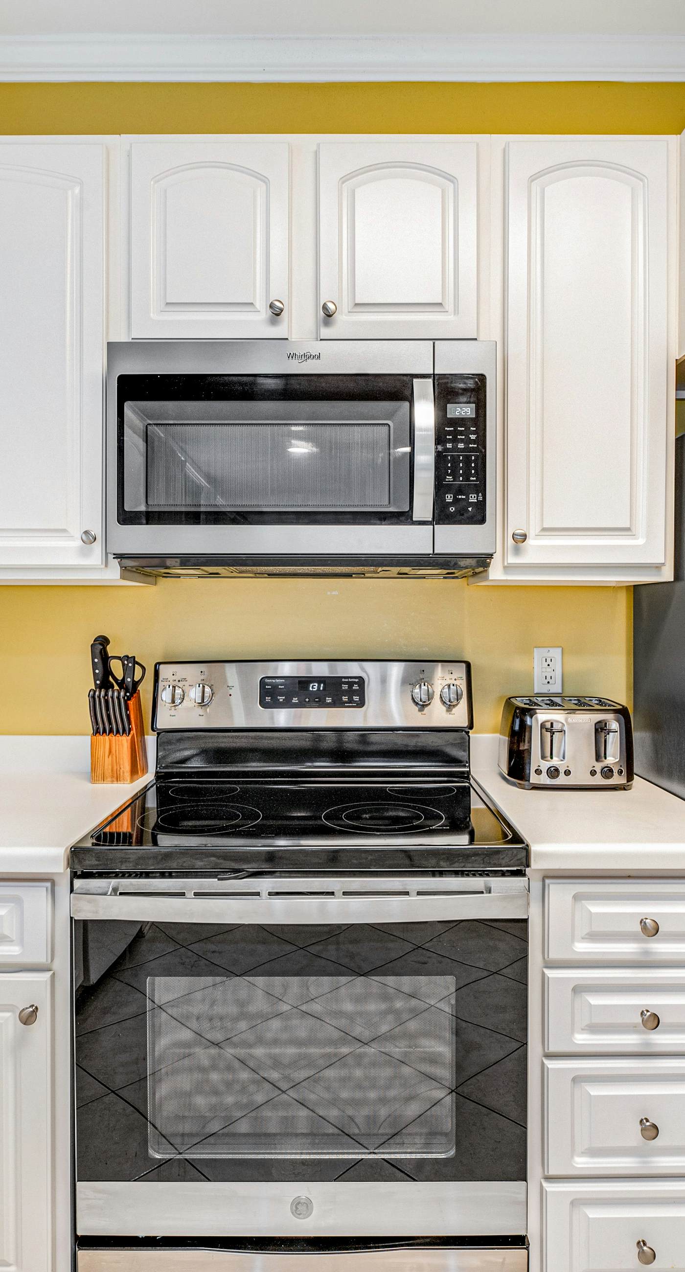 Beachfront condo with Gulf front shared pool, private balcony, and grilling area