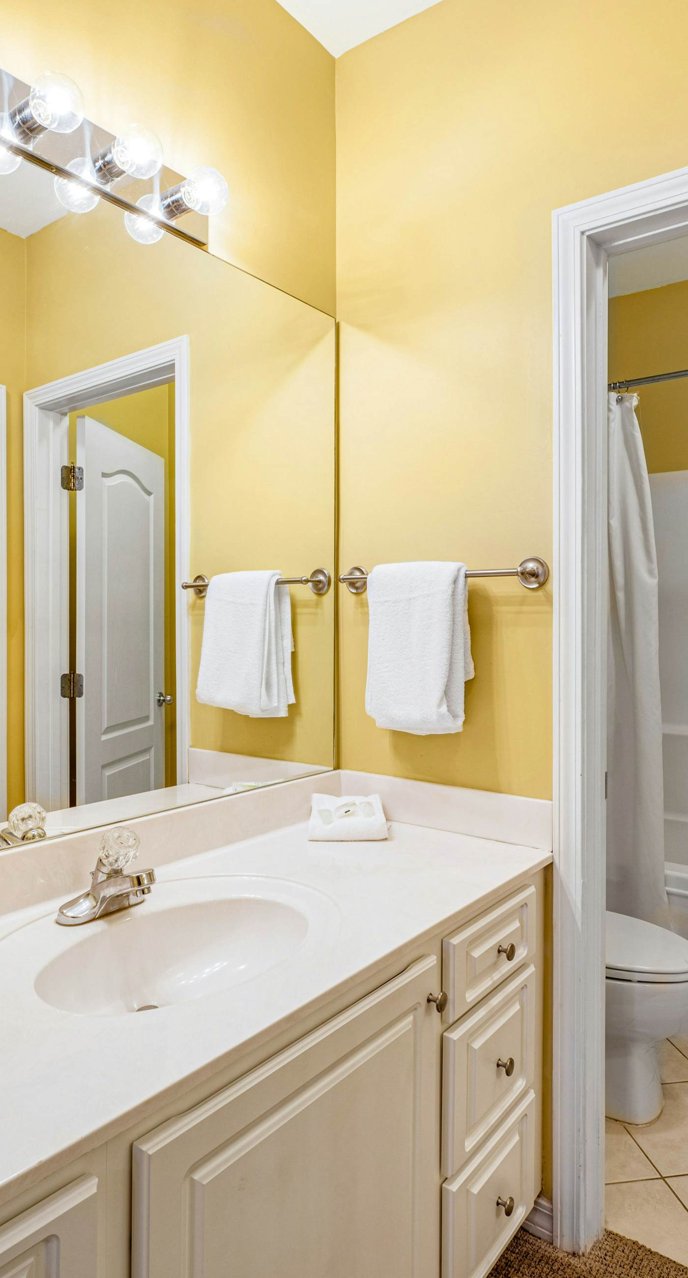 Beachfront condo with Gulf front shared pool, private balcony, and grilling area