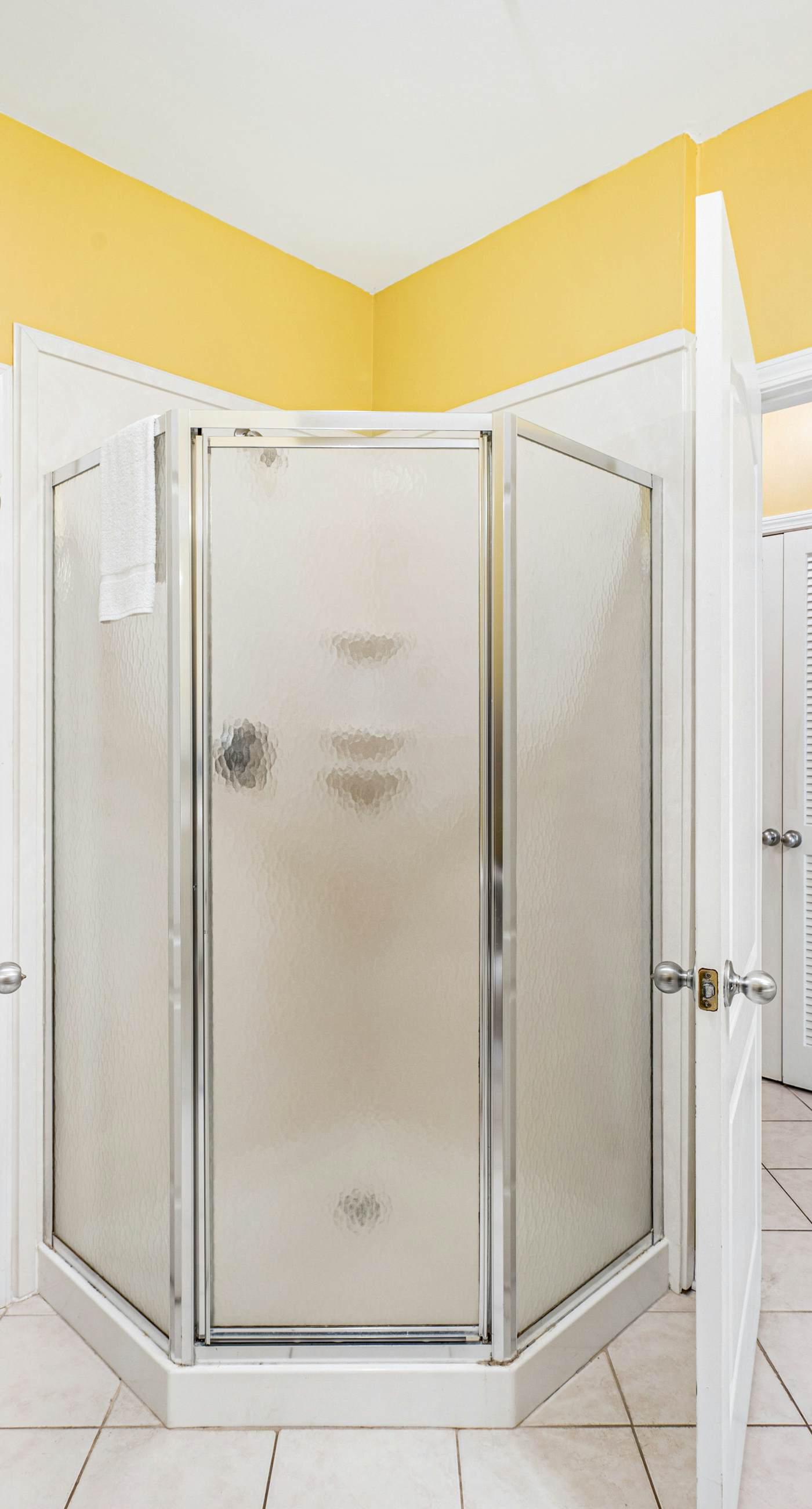 Beachfront condo with Gulf front shared pool, private balcony, and grilling area