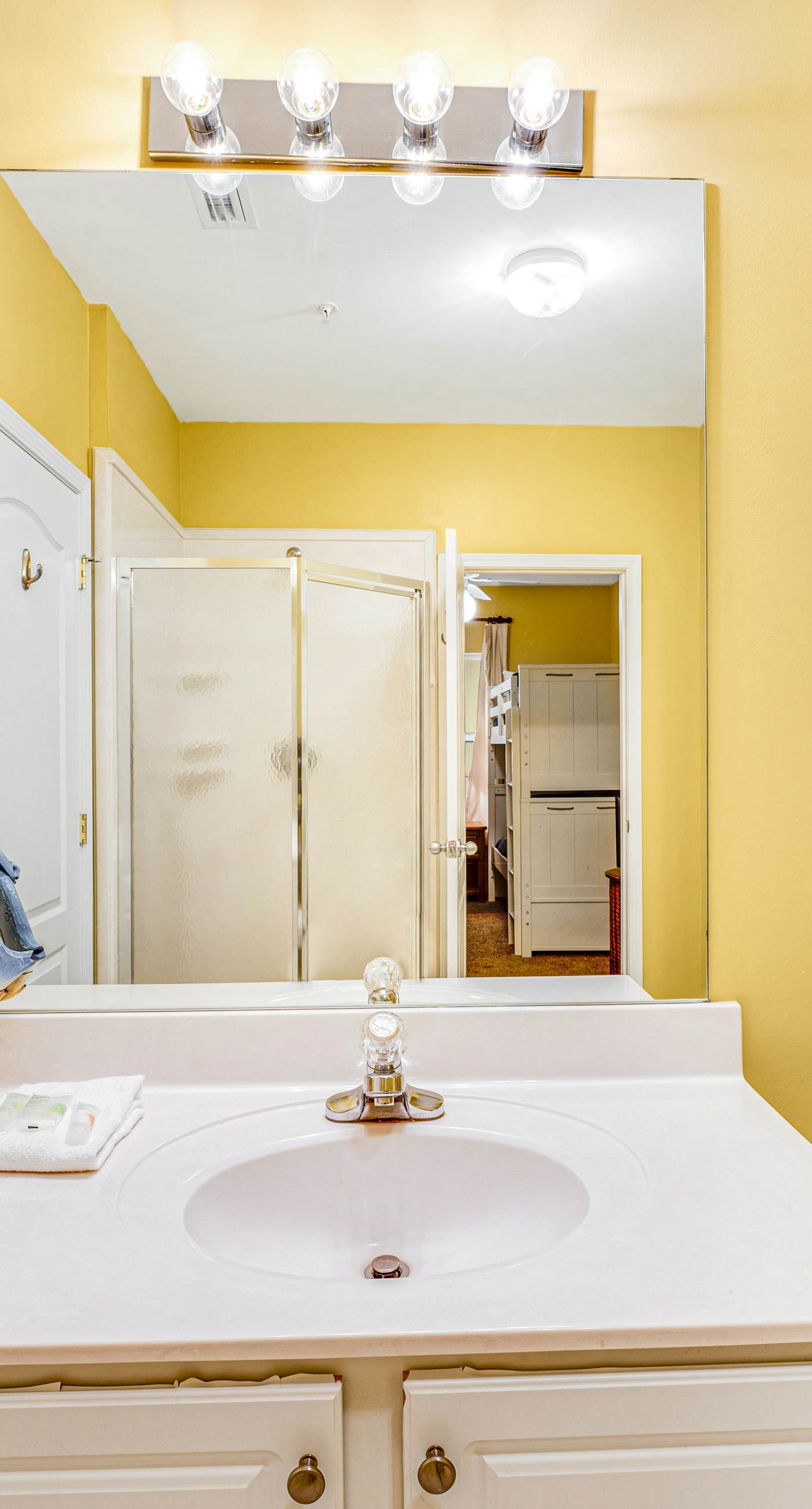 Beachfront condo with Gulf front shared pool, private balcony, and grilling area