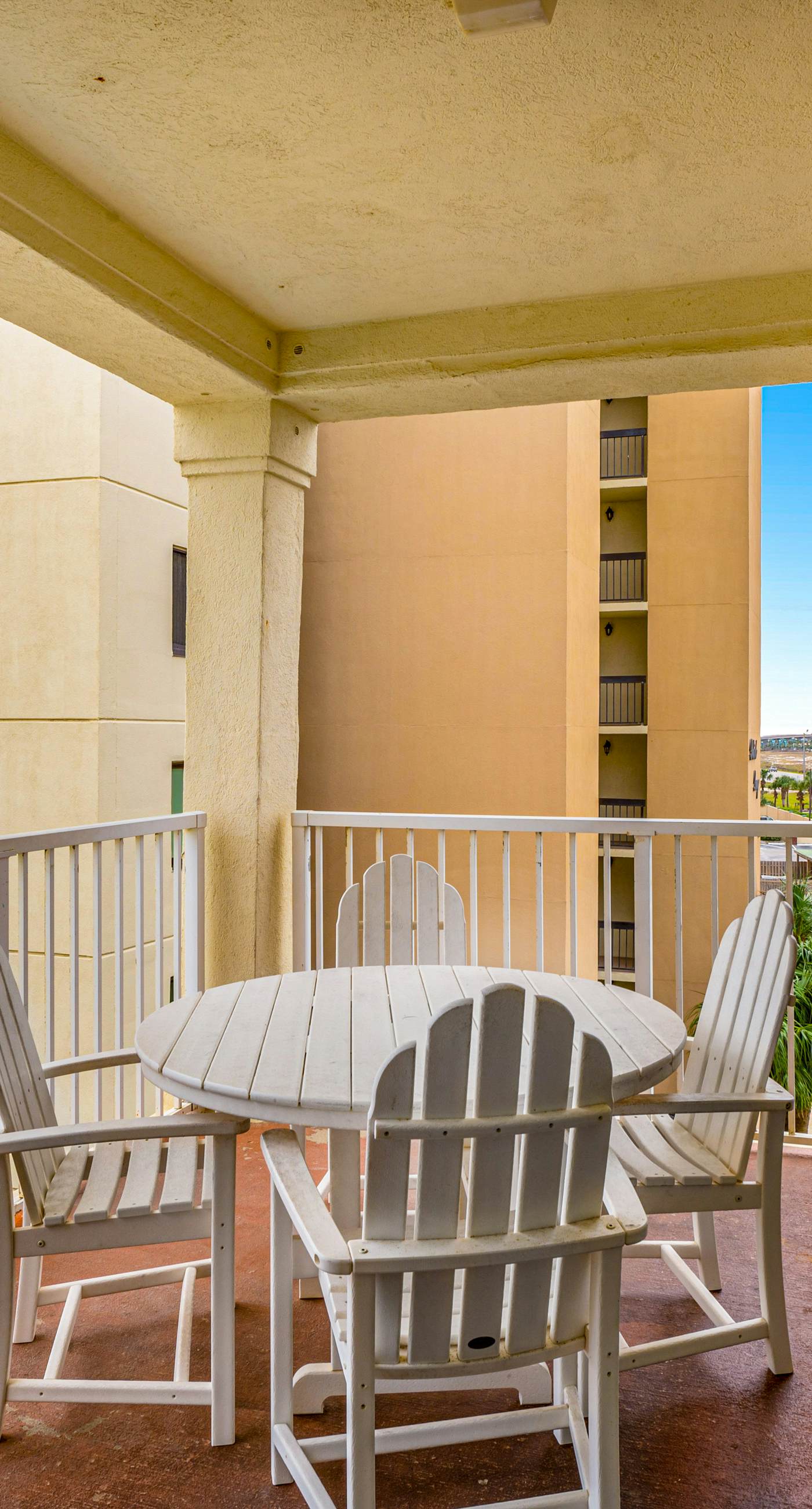 Beachfront condo with Gulf front shared pool, private balcony, and grilling area