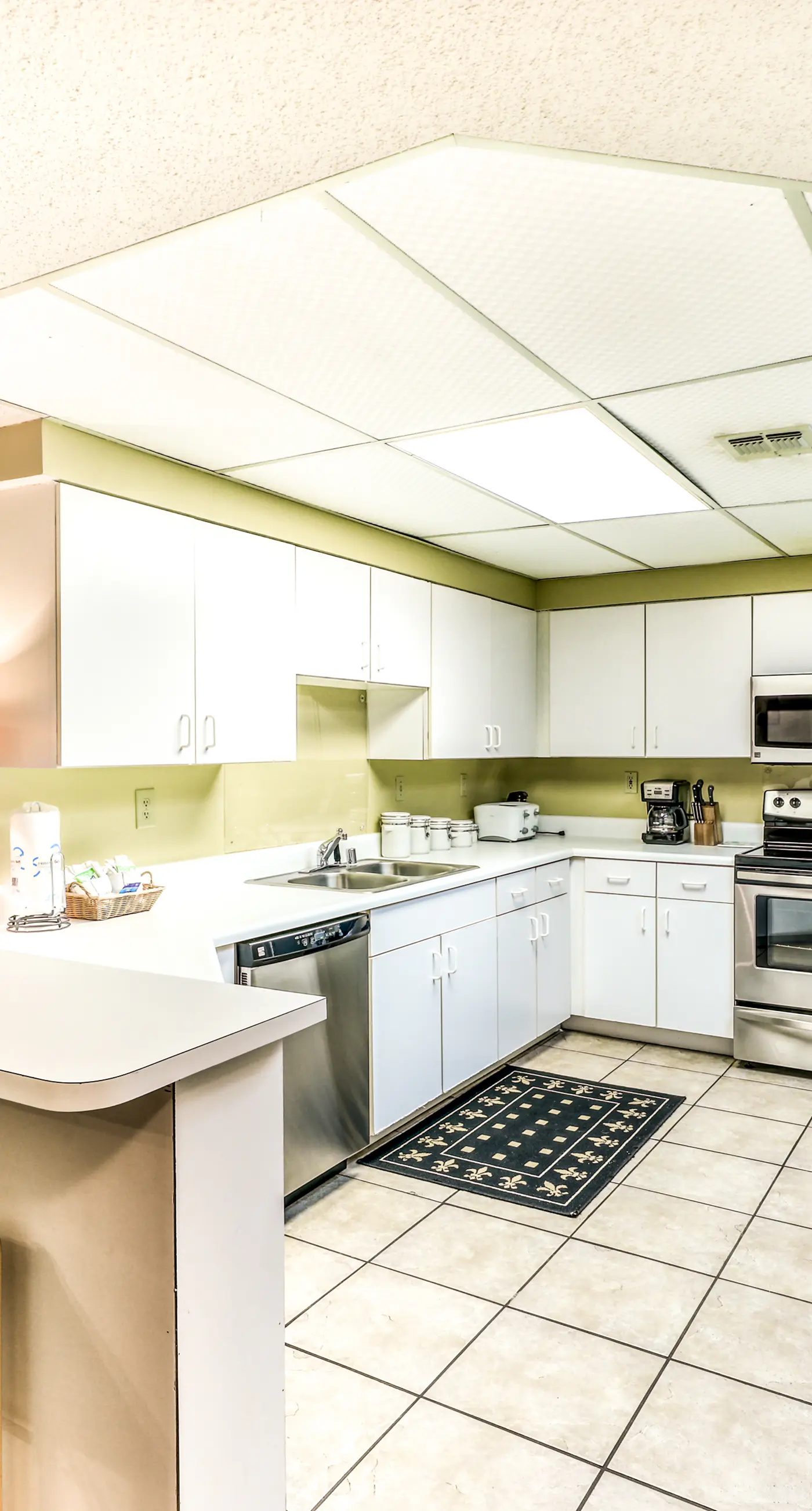 Beachfront condo with shared outdoor pool, heated indoor pool, sauna, & grill area