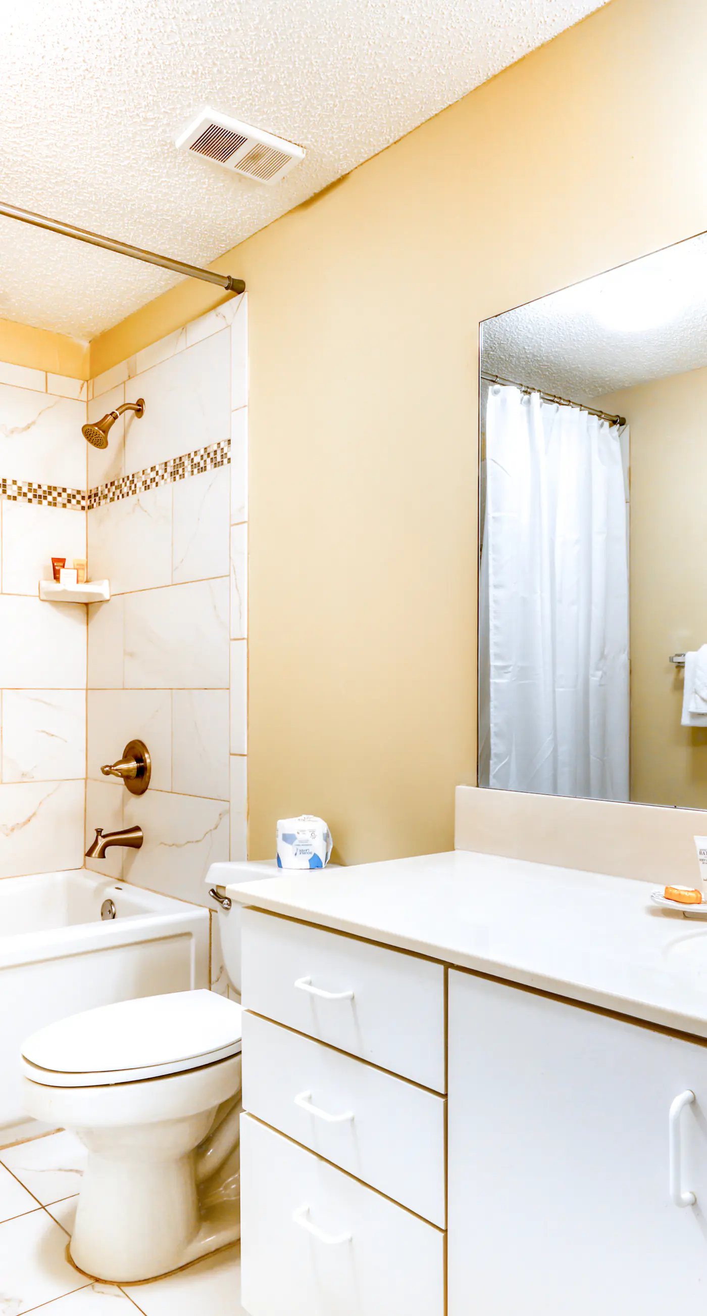 Beachfront condo with shared outdoor pool, heated indoor pool, sauna, & grill area