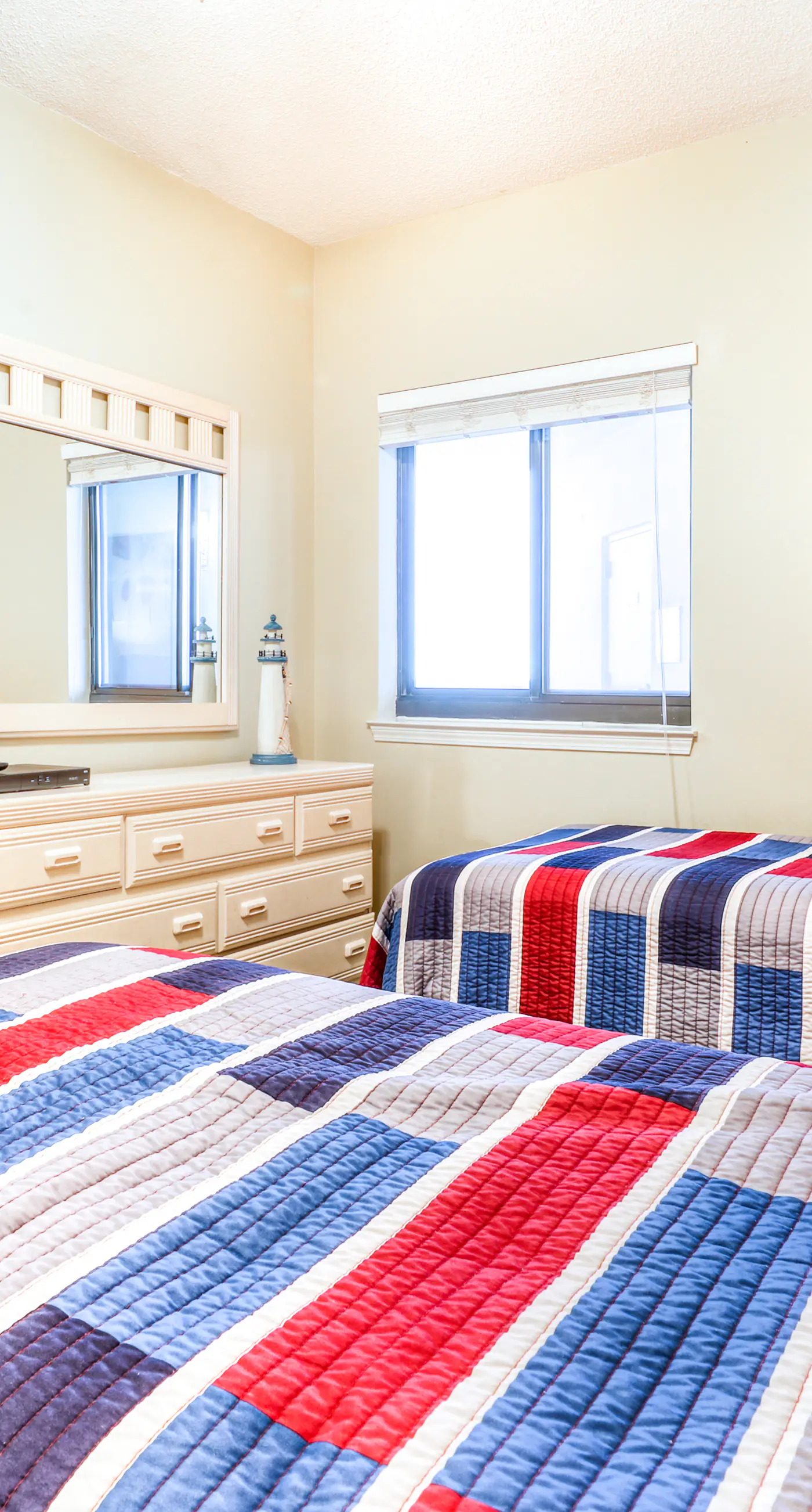 Beachfront condo with shared outdoor pool, heated indoor pool, sauna, & grill area