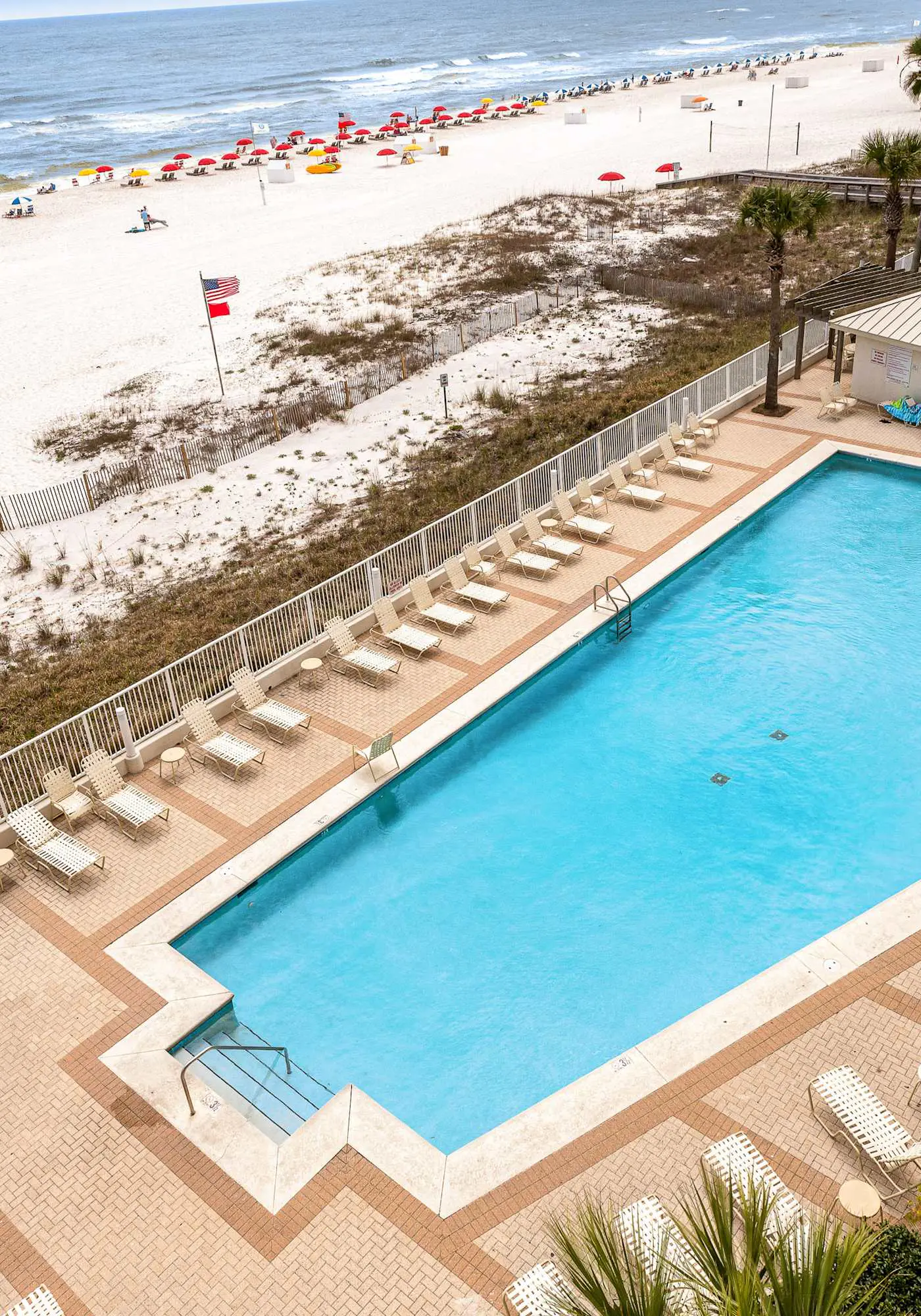 Beachfront condo with private beach access, hot tub, tennis court & pools