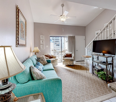 Inviting condo w/ a spacious living area, shared pools, & easy beach access