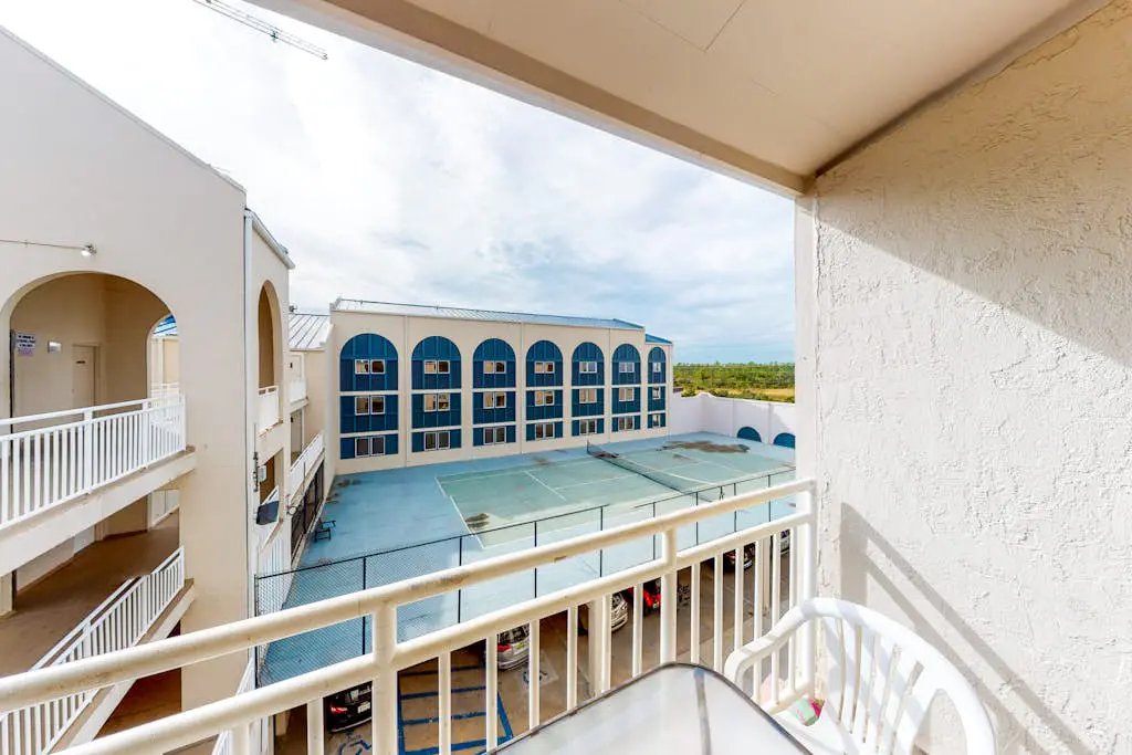 Gulf view condo w/ a full kitchen, private balcony, shared pools, & tennis court