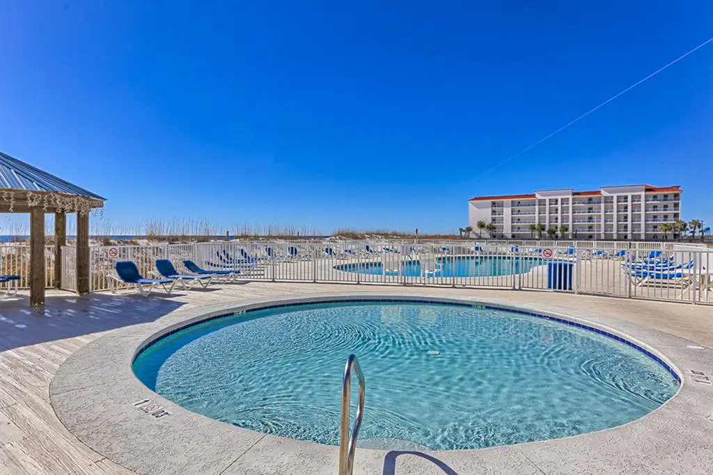 Gulf view condo w/ a full kitchen, private balcony, shared pools, & tennis court