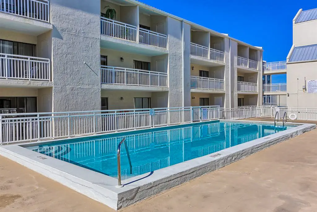 Gulf view condo w/ a full kitchen, private balcony, shared pools, & tennis court