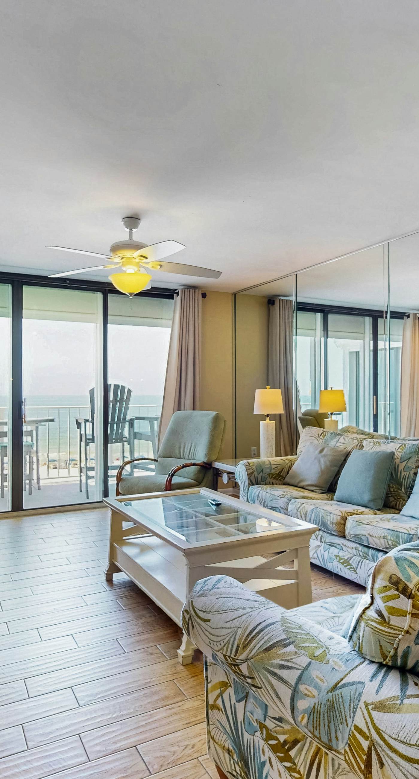 Waterfront condo w/ an open dining & living area, private balcony, shared pools