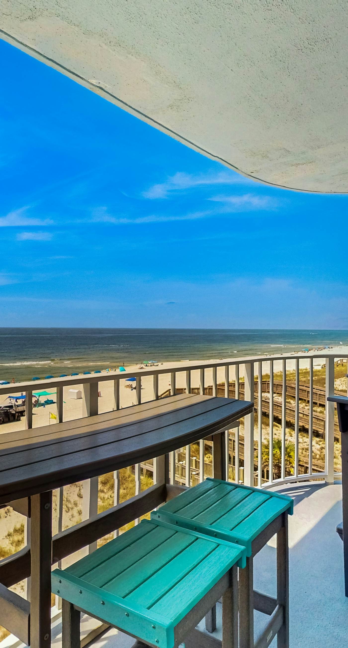 Waterfront condo w/ an open dining & living area, private balcony, shared pools