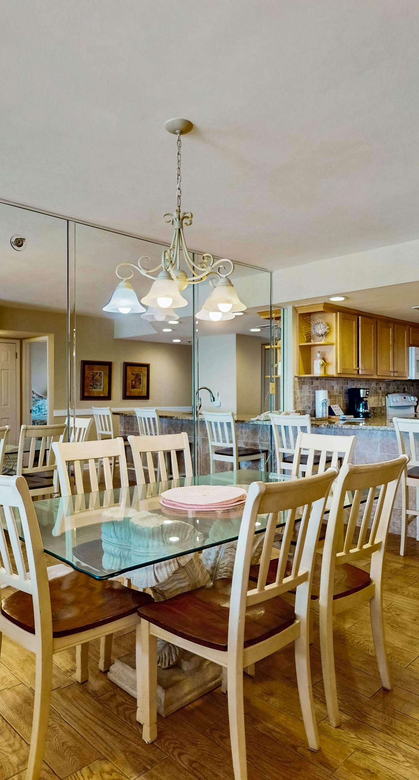 Waterfront condo w/ an open dining & living area, private balcony, shared pools