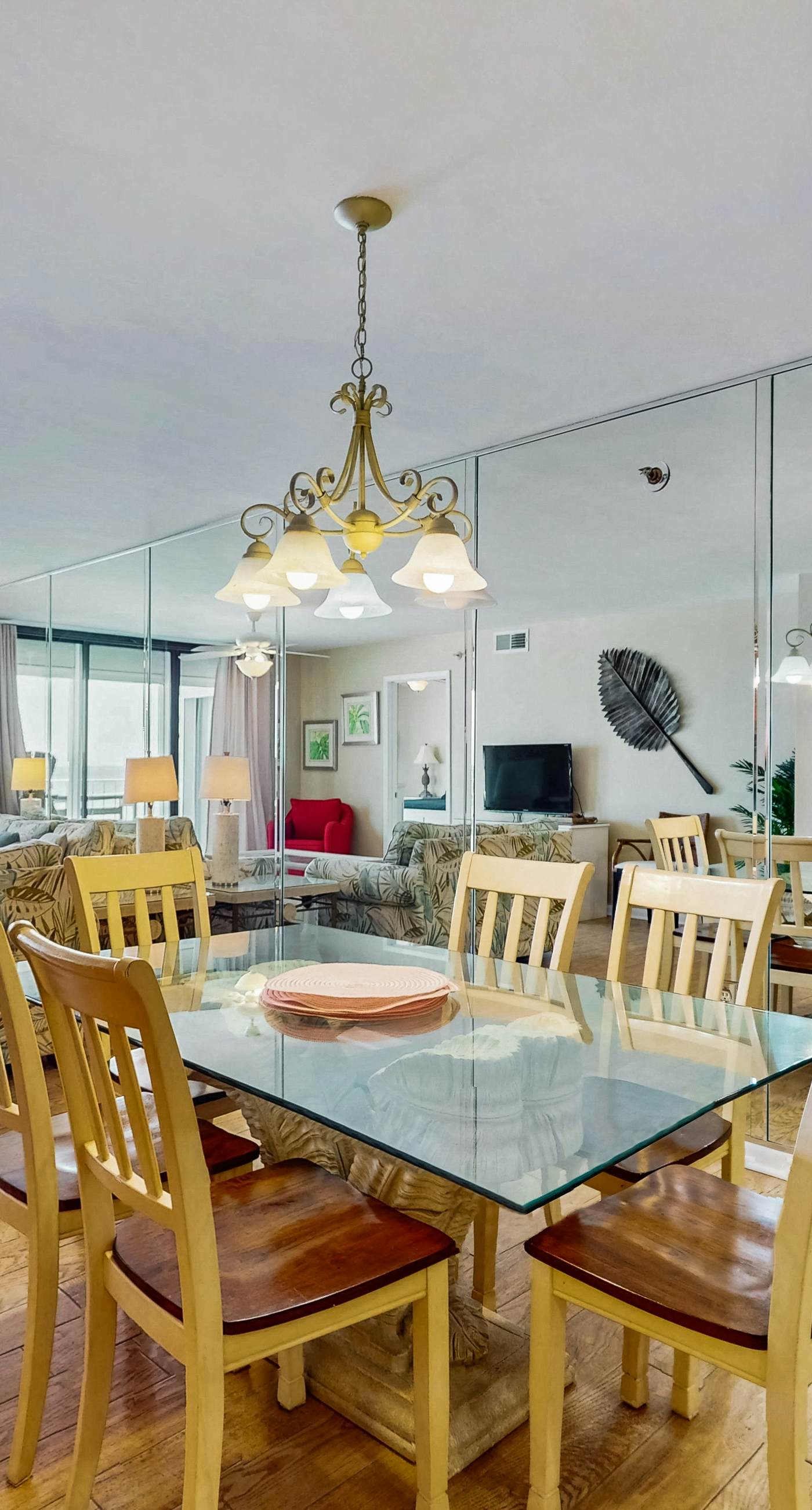 Waterfront condo w/ an open dining & living area, private balcony, shared pools