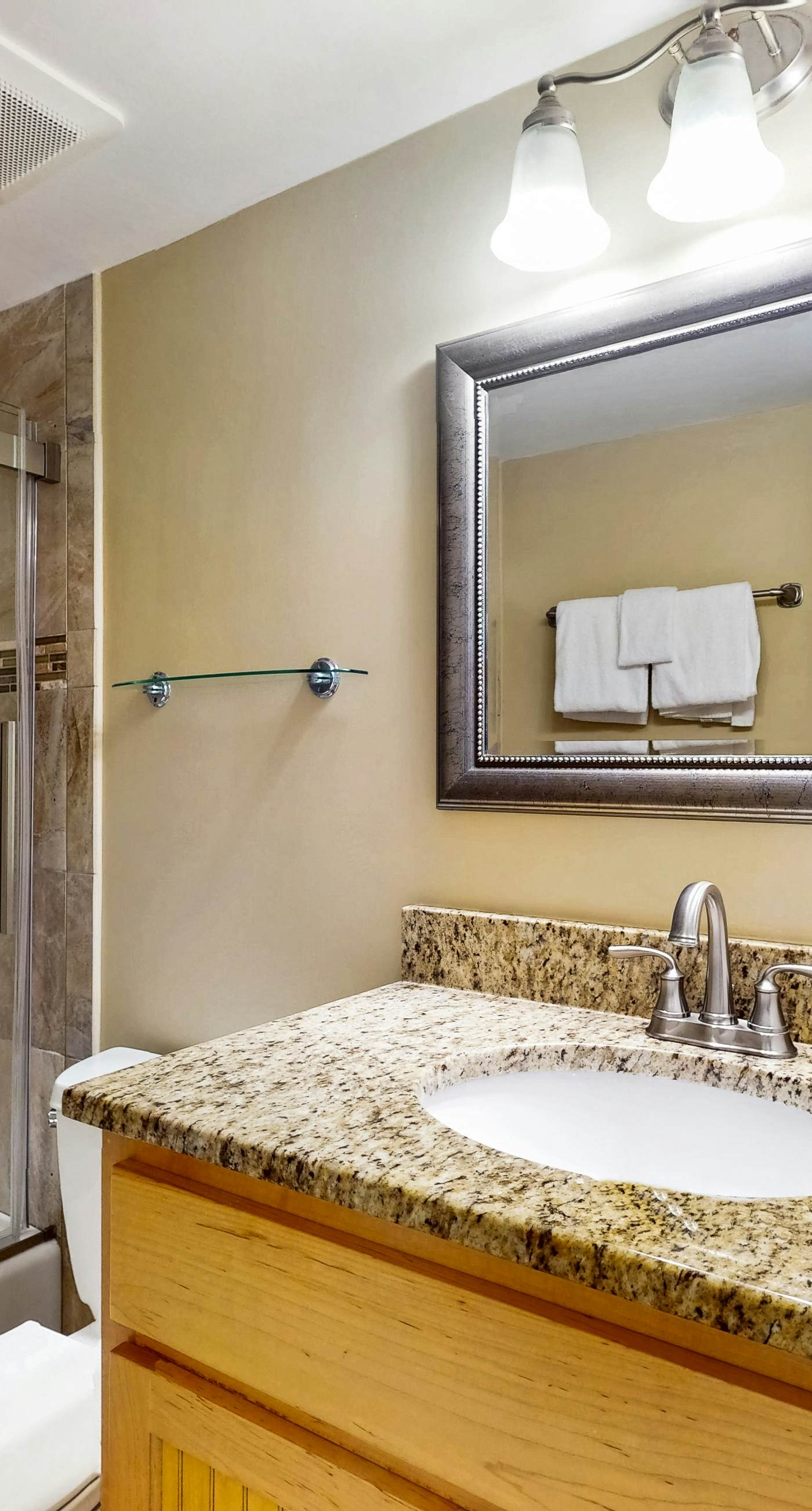 Waterfront condo w/ an open dining & living area, private balcony, shared pools