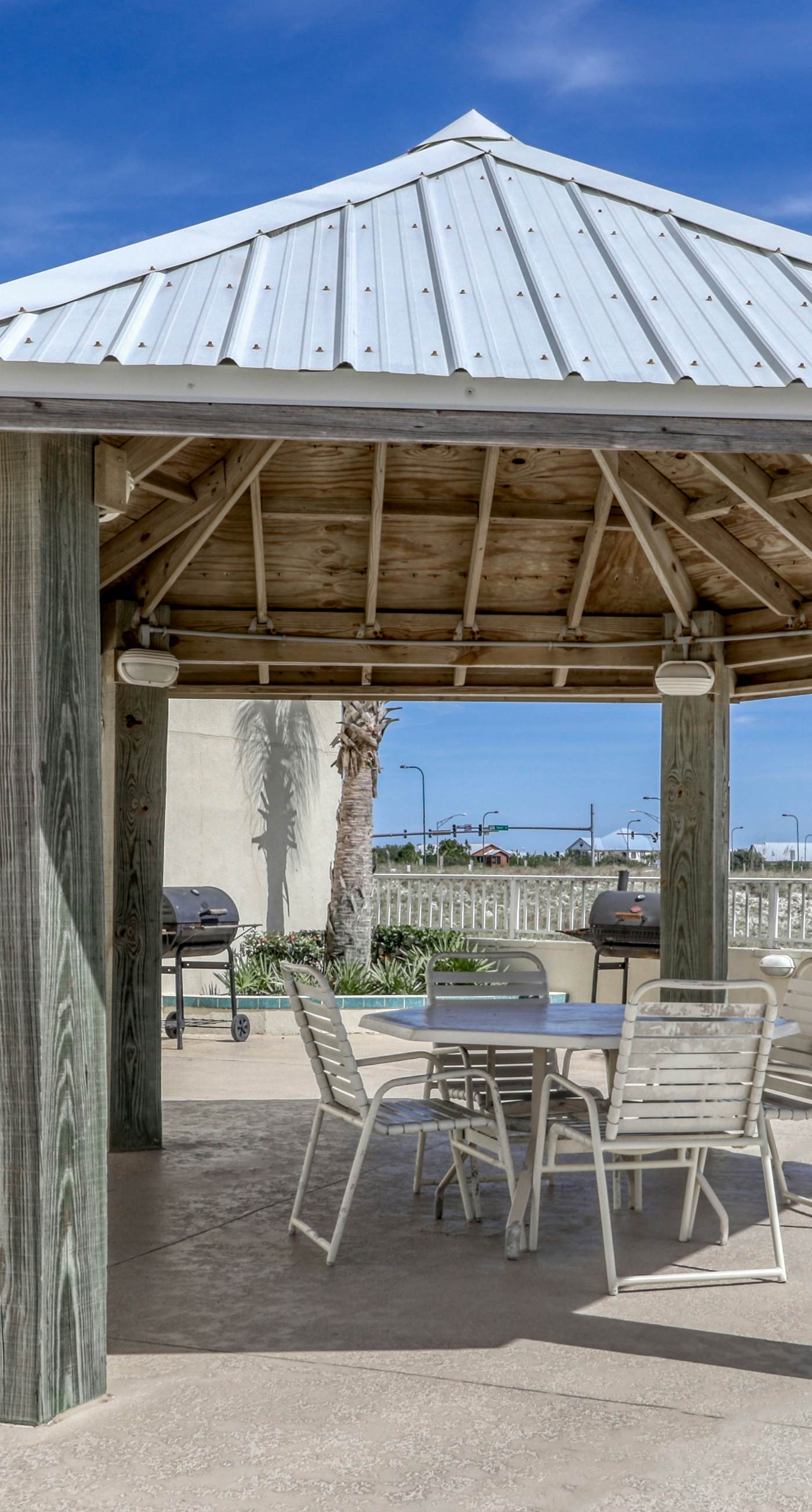 Waterfront condo w/ an open dining & living area, private balcony, shared pools