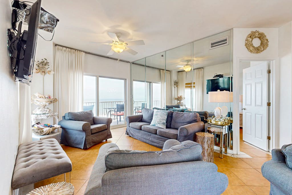 Gulf front condo w a full kitchen, private balcony, shared pools, & hot tub