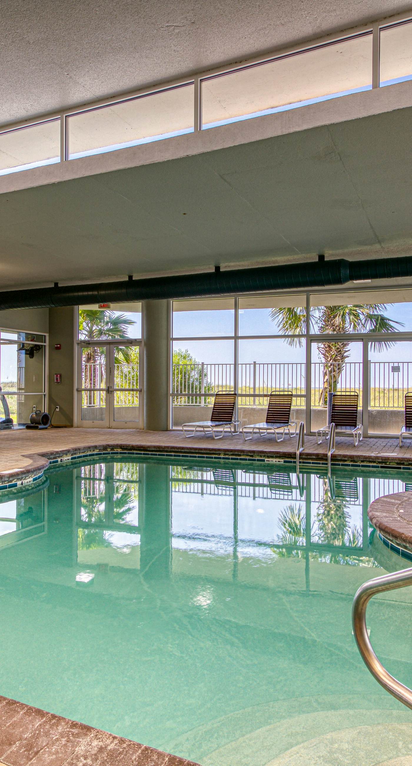 Gulf front condo w a full kitchen, private balcony, shared pools, & hot tub