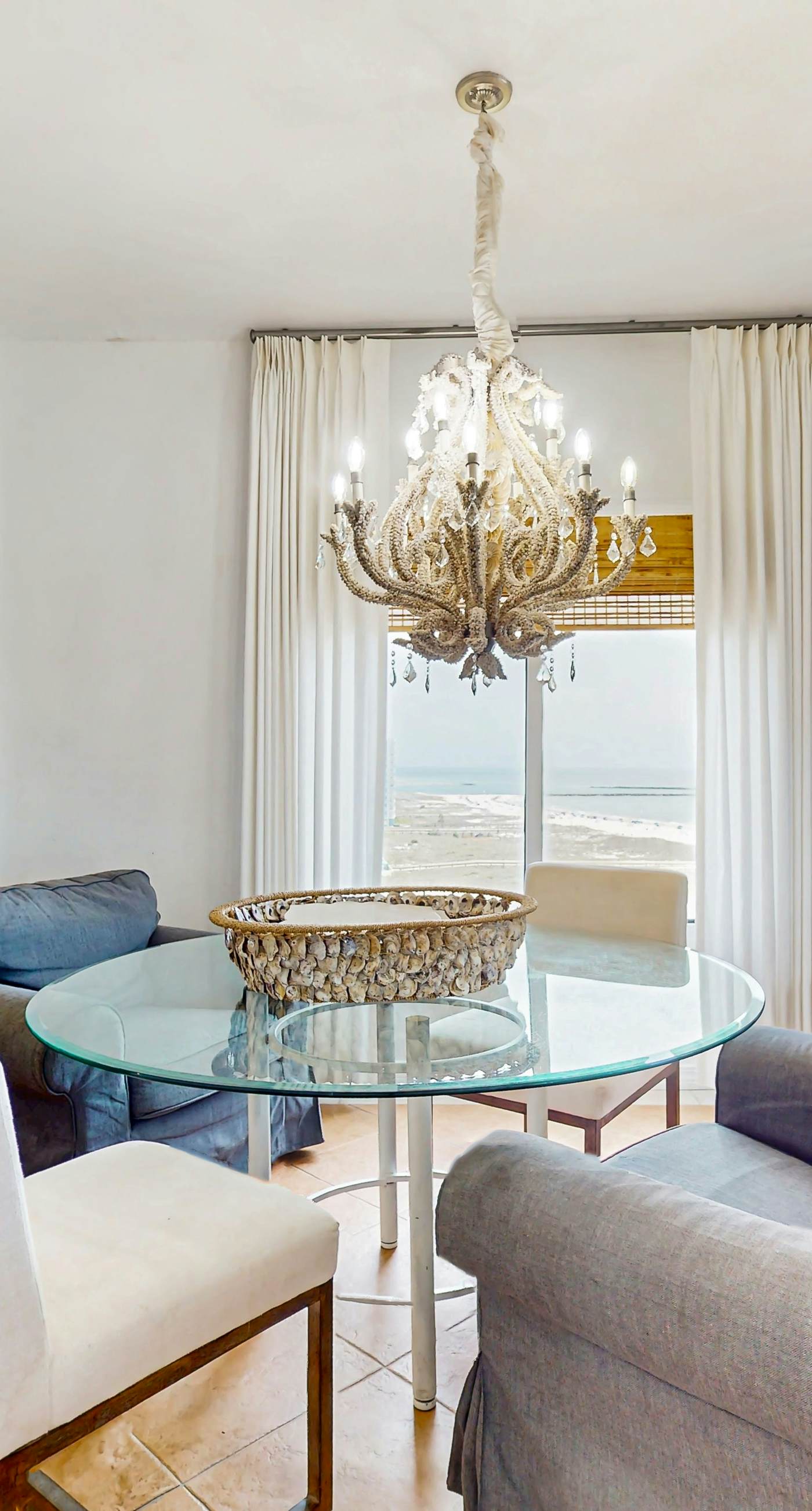 Gulf front condo w a full kitchen, private balcony, shared pools, & hot tub