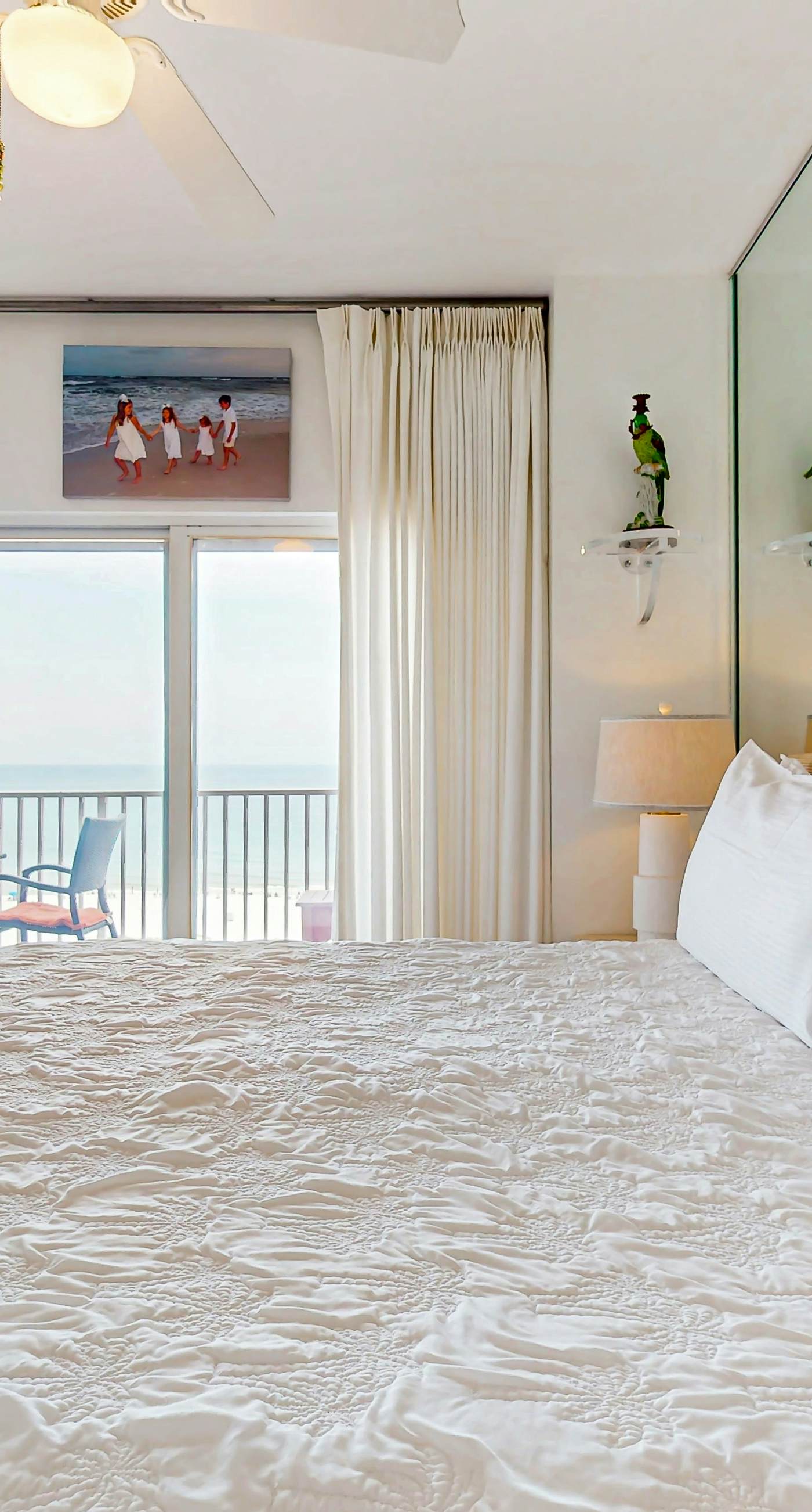 Gulf front condo w a full kitchen, private balcony, shared pools, & hot tub