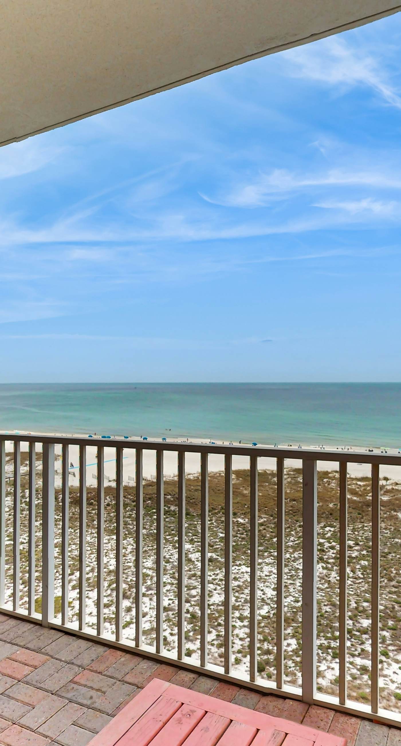 Gulf front condo w a full kitchen, private balcony, shared pools, & hot tub