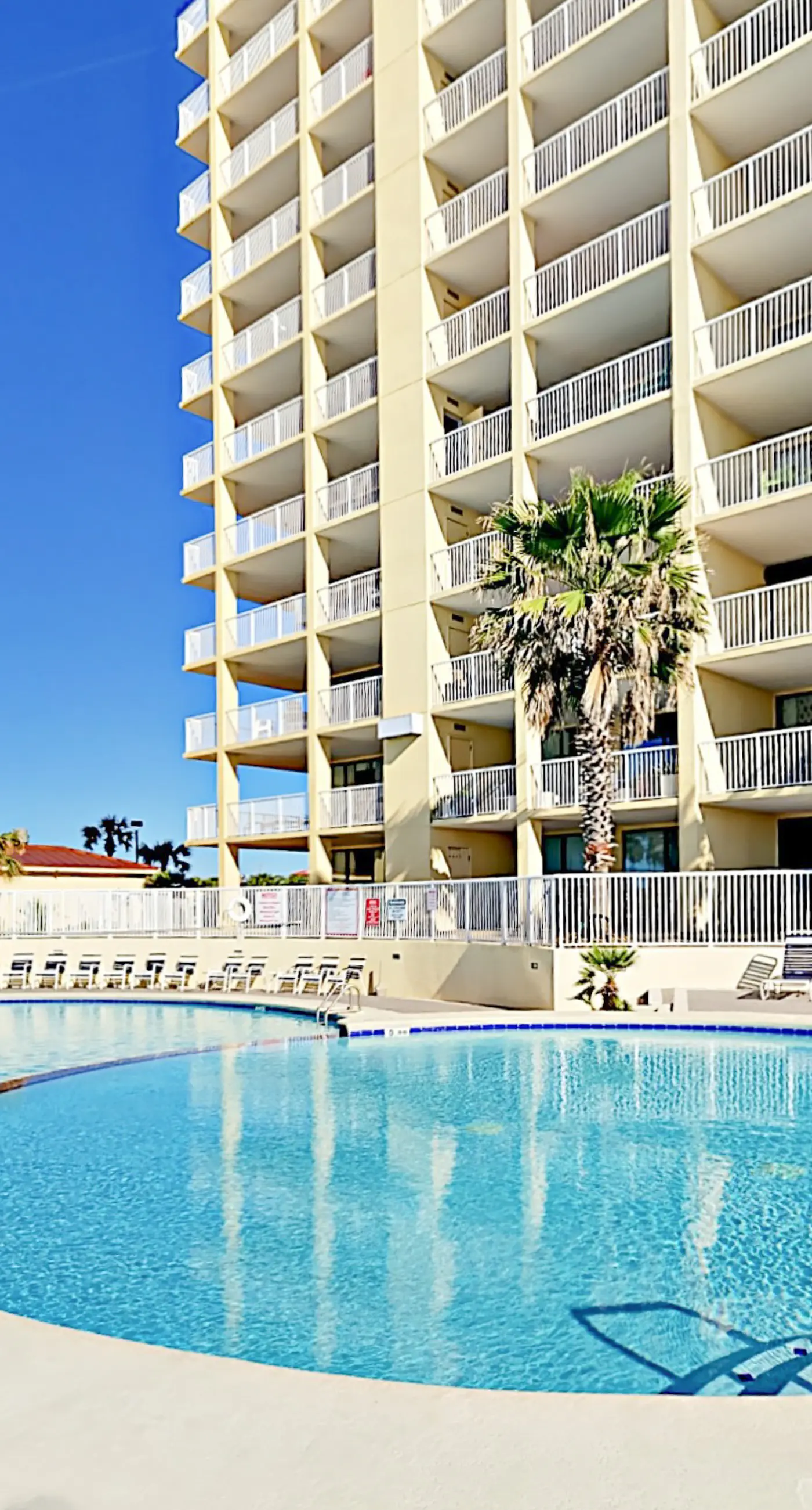 Stunning oceanfront top-floor condo with Gulf views, central AC & pool access