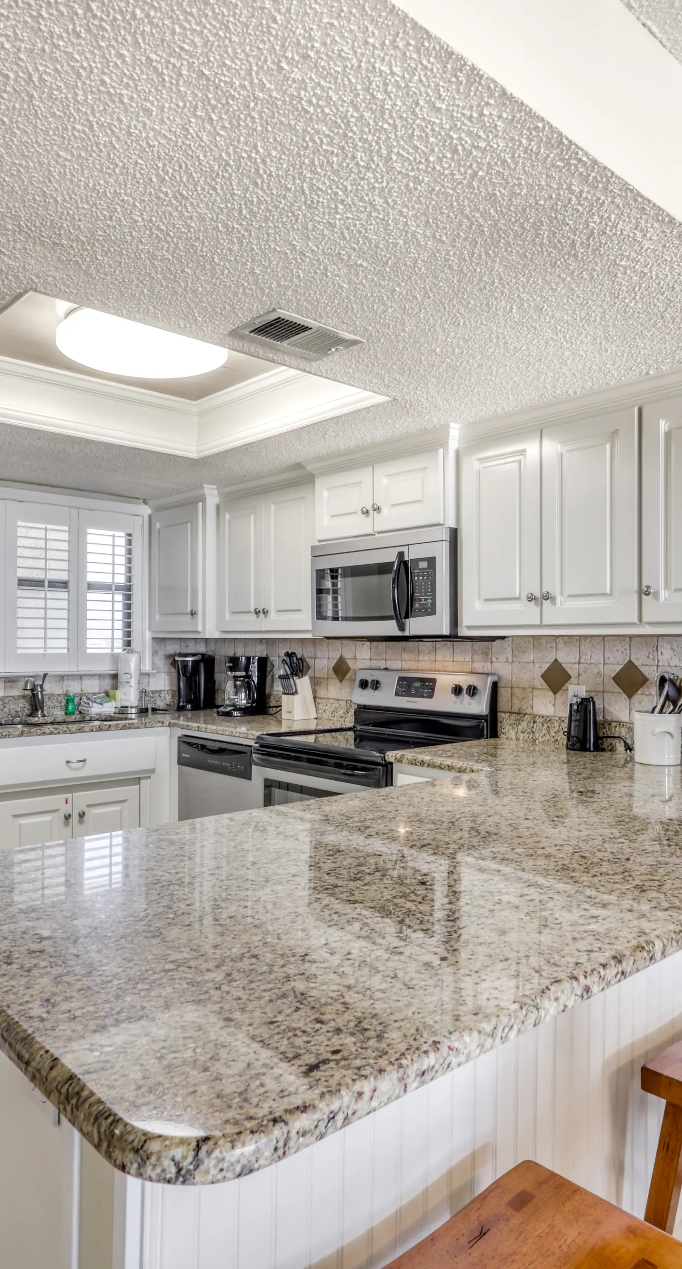 Fourth-floor beach condo w amazing views, indoor pool, & beach access