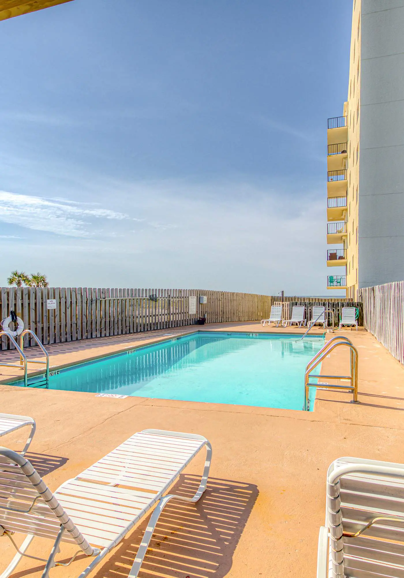 Fourth-floor beach condo w amazing views, indoor pool, & beach access